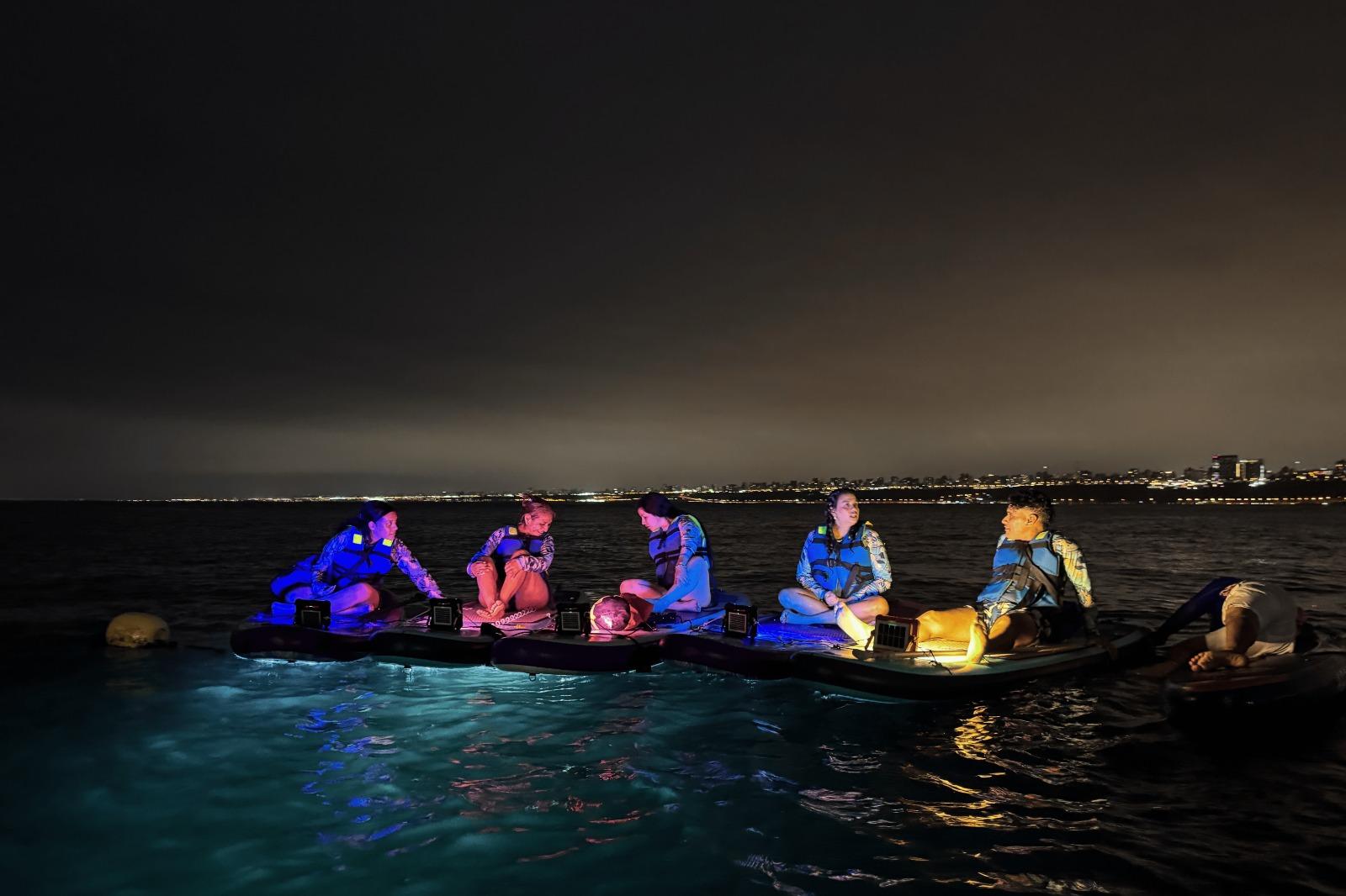 LED Paddleboarding Under the Stars with Campfire