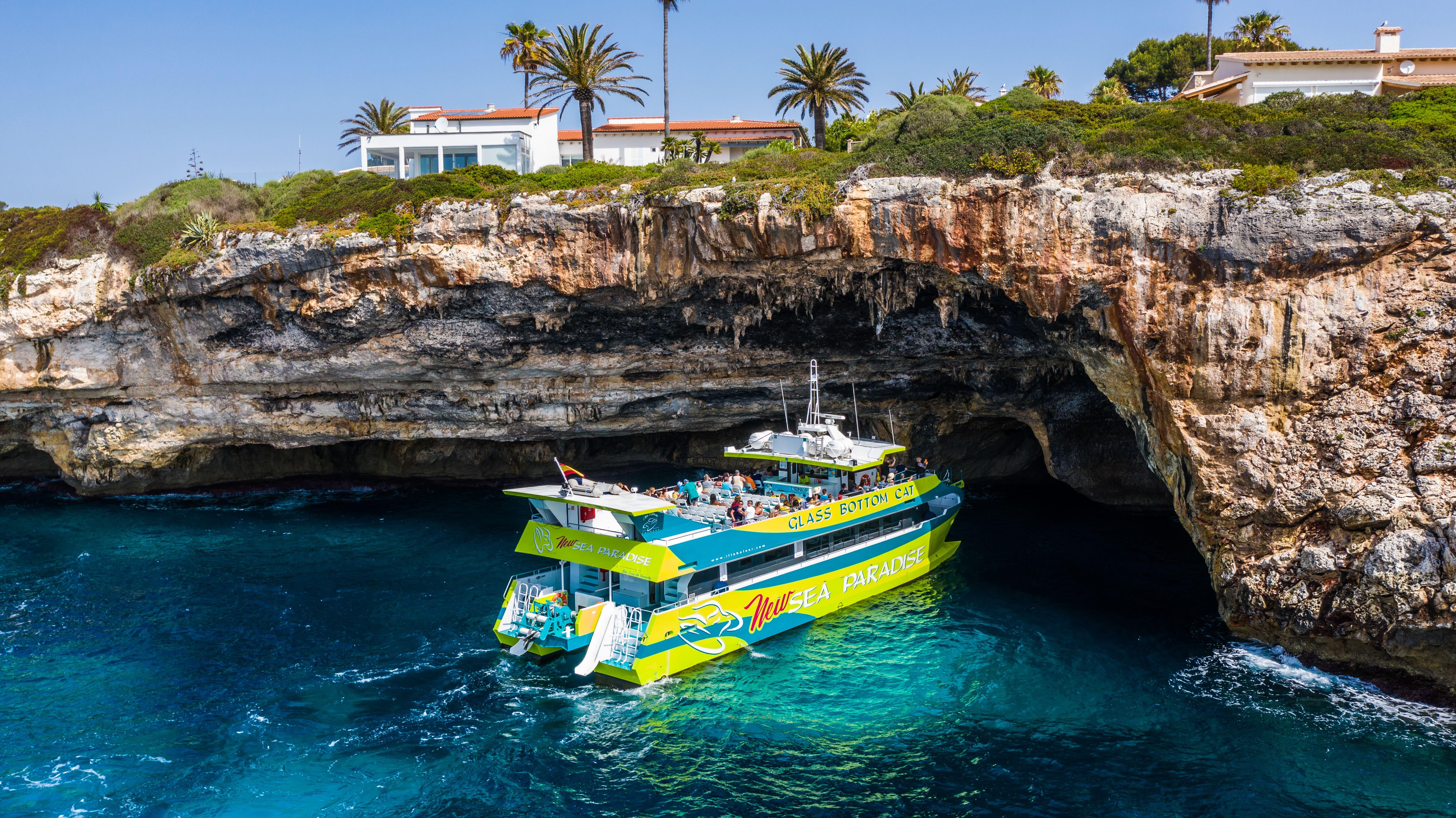 East Coast Glass Bottom Boat Adventure from Sa Coma