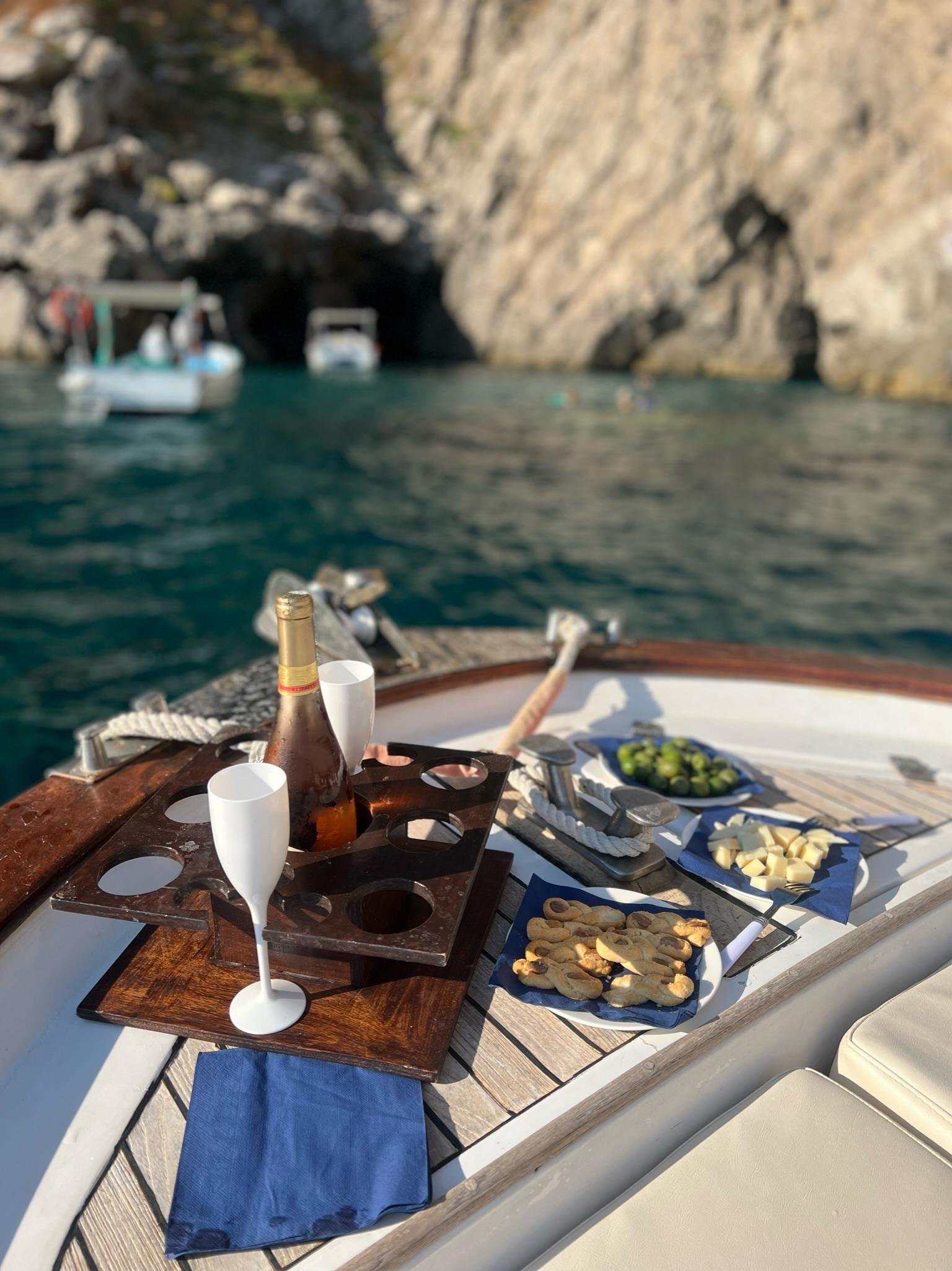 Capri Private Boat Tour: Faraglioni, Sea Caves & Swimming Stops