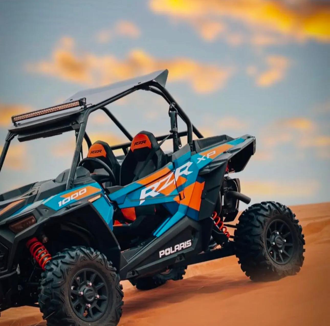 Doha Desert Safari: Sunset Dune Bashing, Camel Ride & Sandboarding