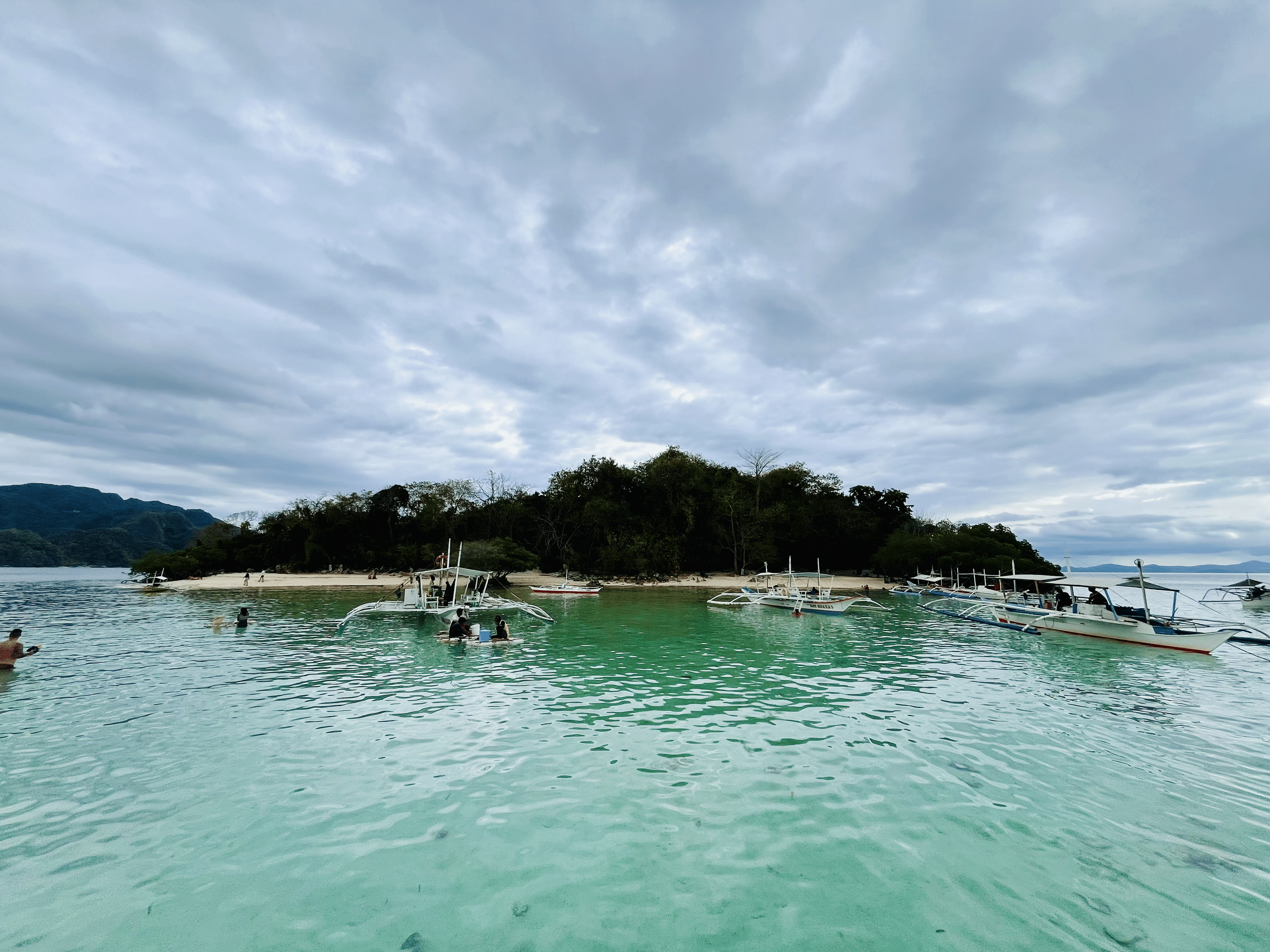 Coron Private Boat Charter with Guide & Island Beach Lunch