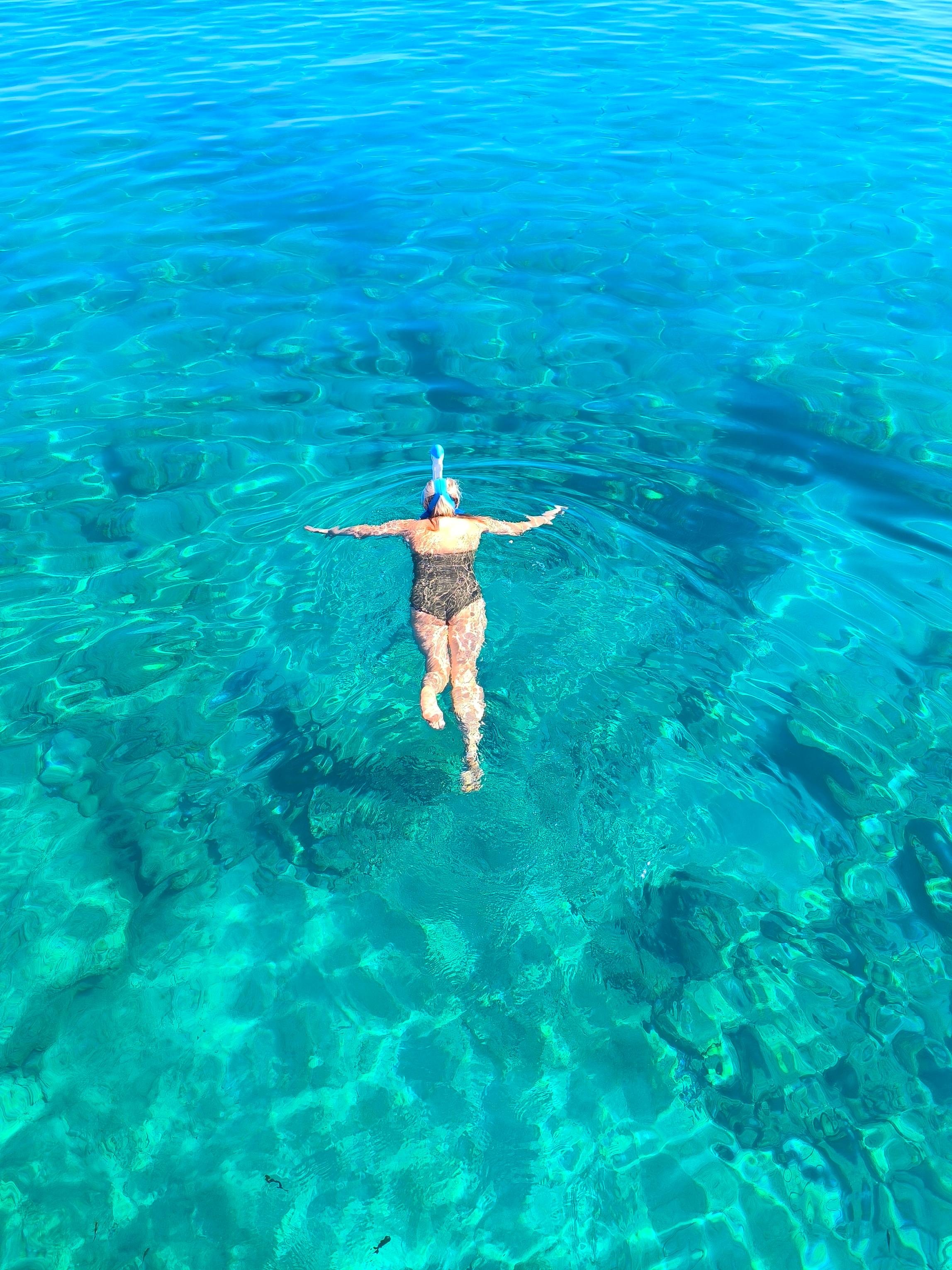 Hersonissos Glass-Bottom Boat Cruise with Swim Stops