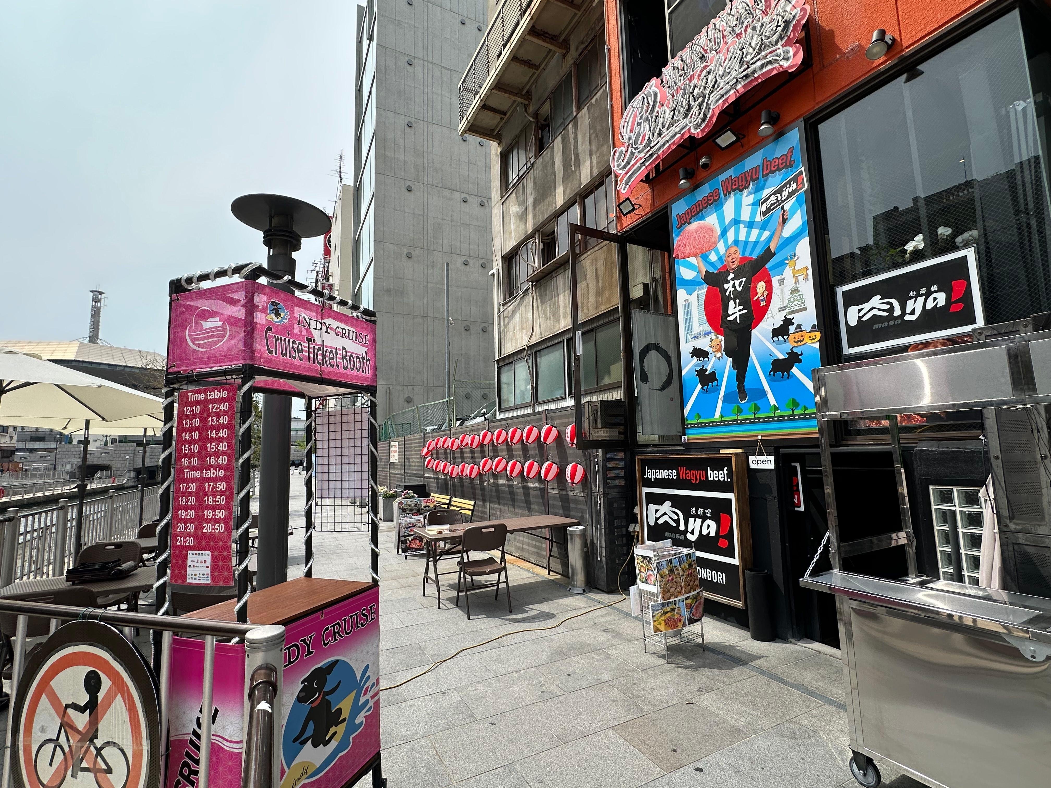 Dotonbori river cruise — Glico sign and neon on the Osaka canal — image 9