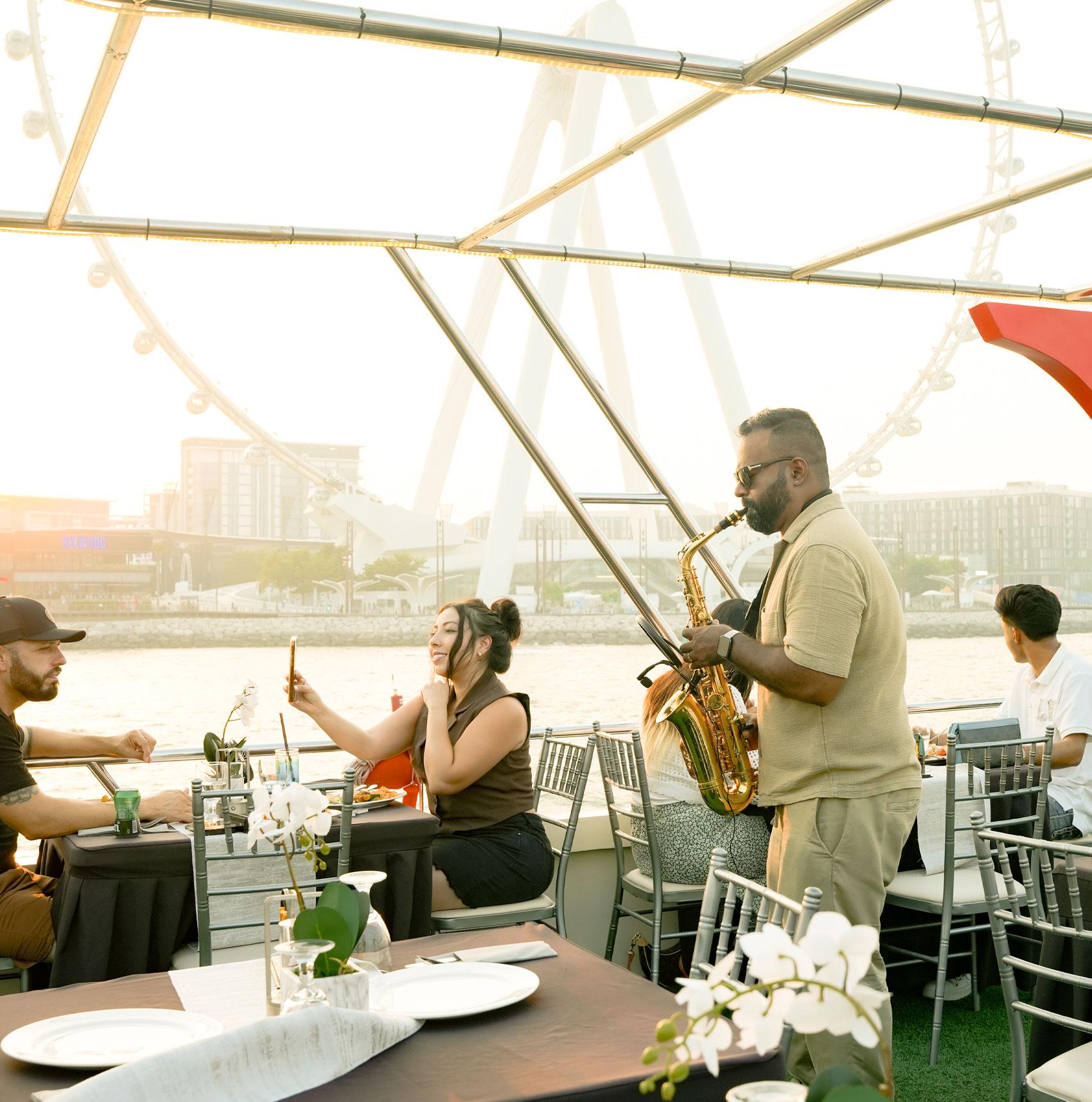 Dubai Marina Sunset & Dinner Cruise with Live Music & Open Bar