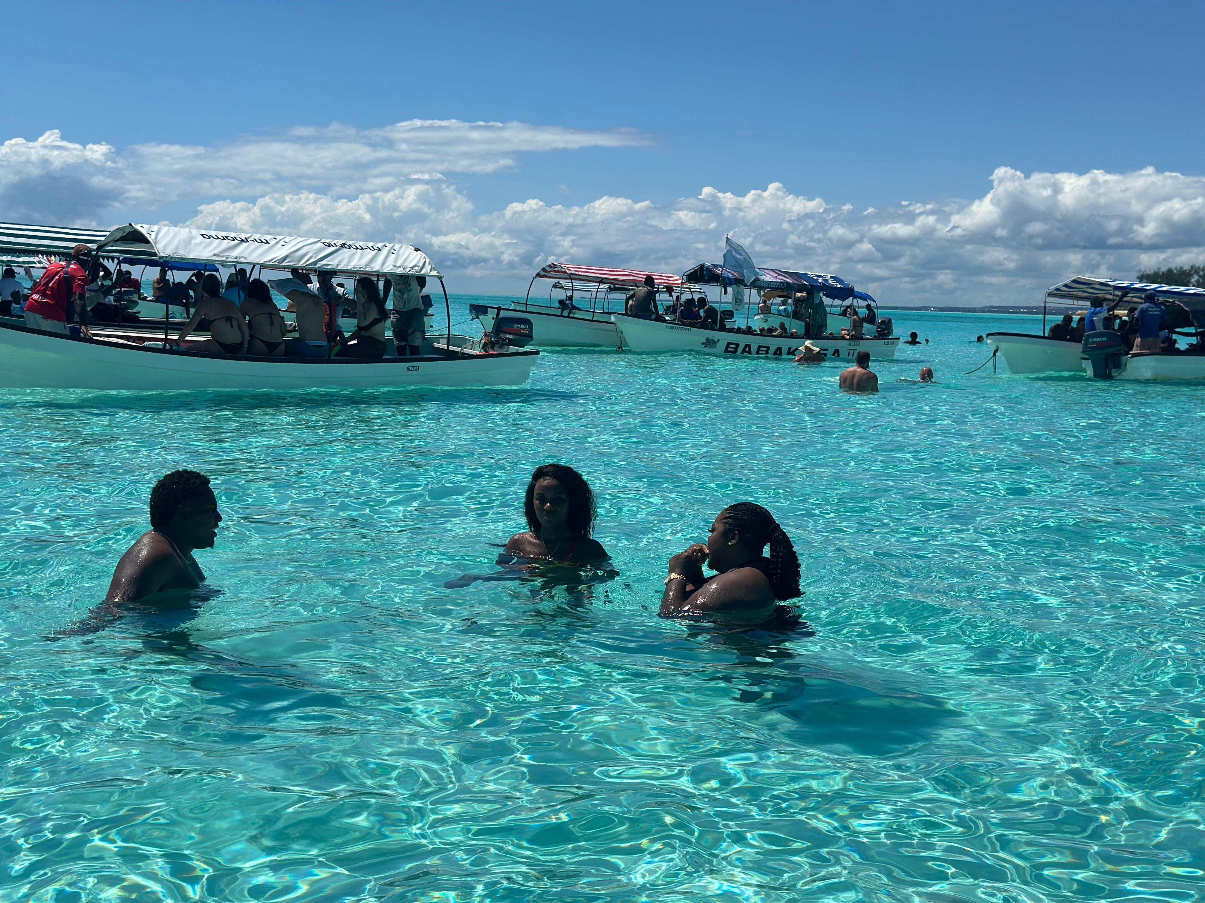 Zanzibar: Mnemba Island Dolphin Swim & Snorkel Adventure