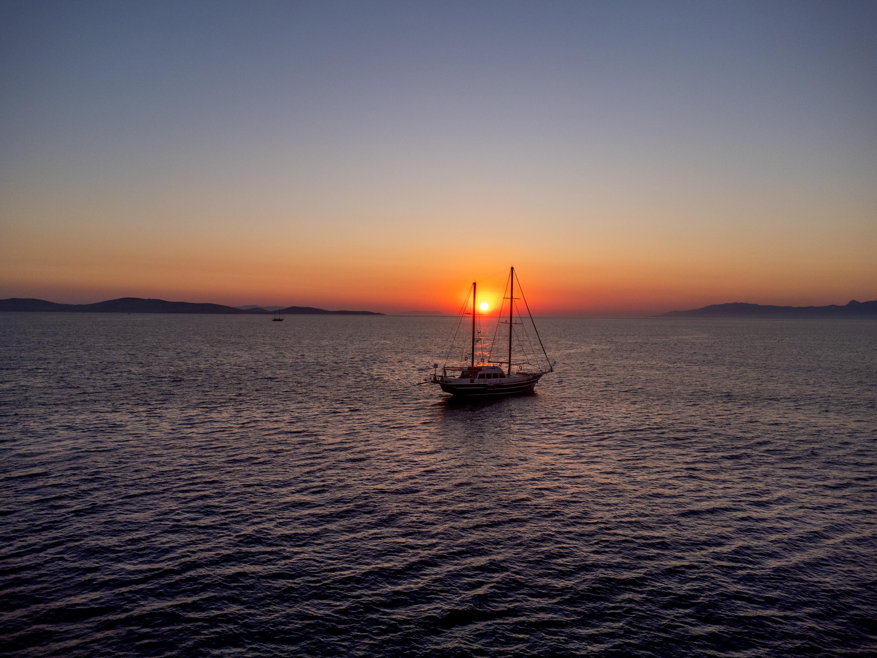 Mykonos Sunset Coastal Cruise with Dinner & Drinks