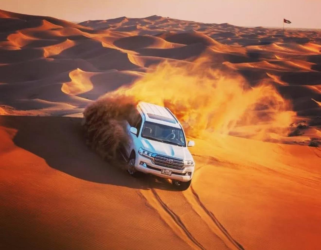 Doha Desert Safari: Sunset Dune Bashing, Camel Ride & Sandboarding