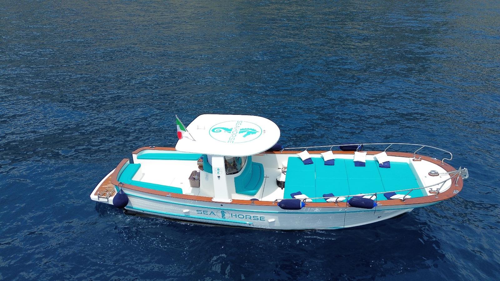 Amalfi Coast Gozzo Boat Tour: Caves, Beaches & Prosecco from Positano