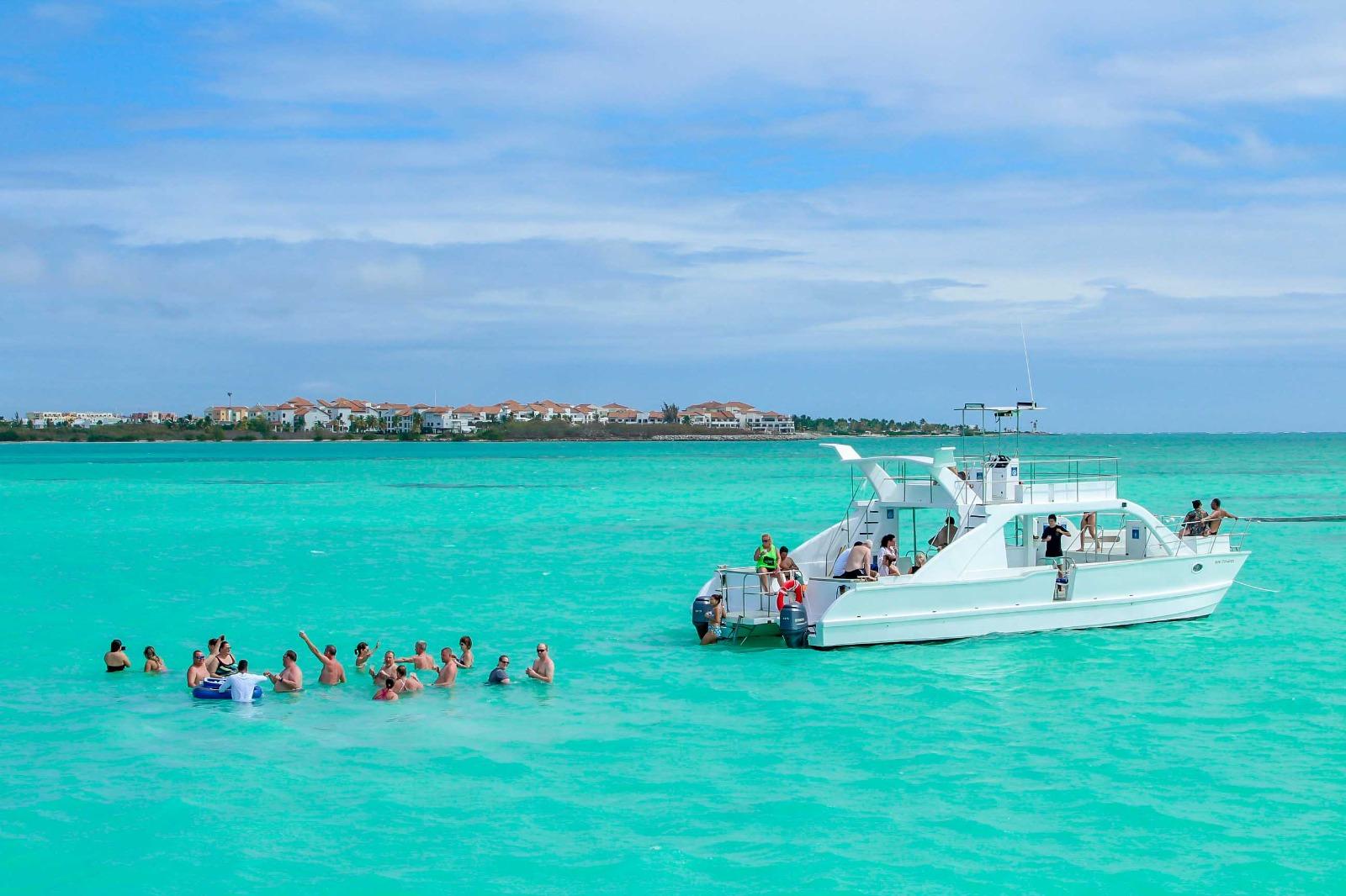 Cap Cana VIP Catamaran Day: Juanillo Beach Club & Blue Hole Cenote