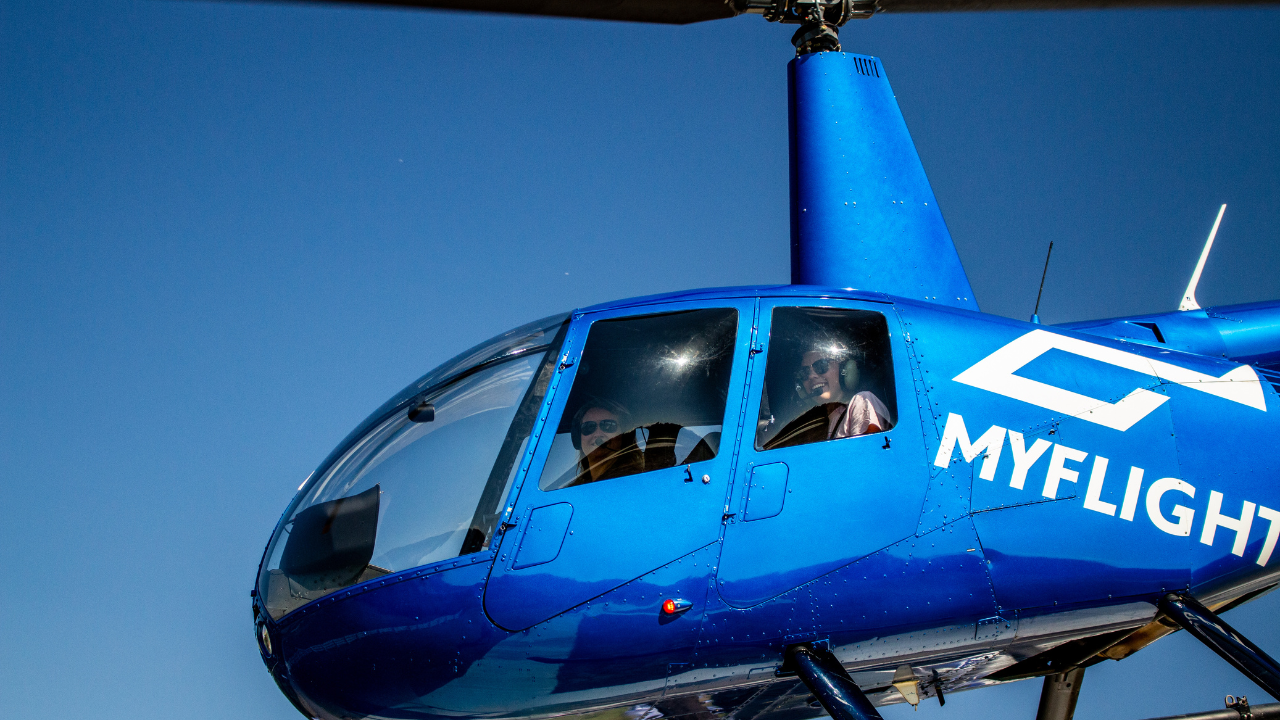 Helicopter Flight Over Detroit's Skyline and Landmarks