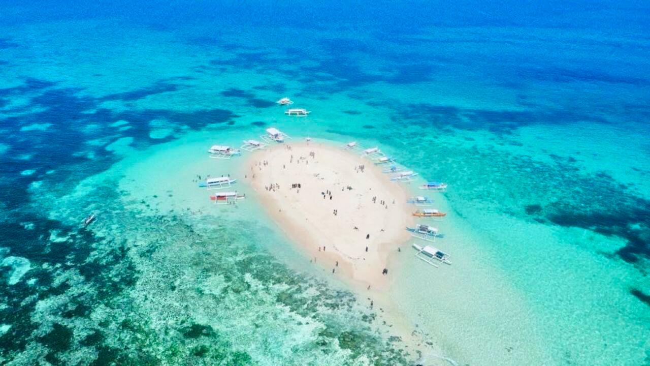 Private Siargao Island Hopping: Guyam, Daku & Naked Island