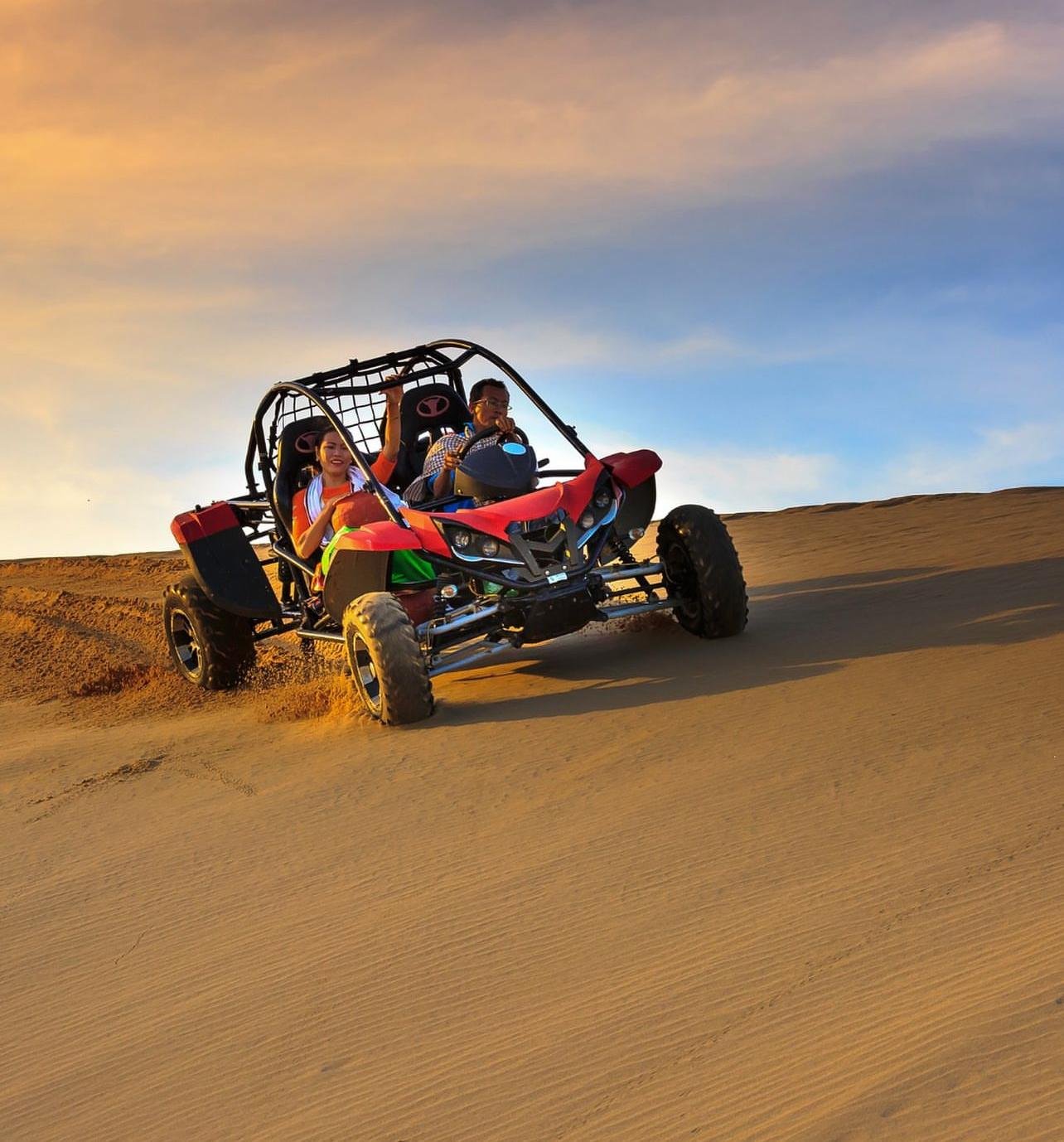 Doha Desert Safari: Sunset Dune Bashing, Camel Ride & Sandboarding