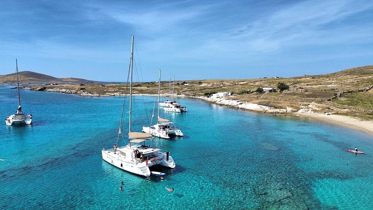 Mykonos Catamaran Cruise with Onboard Lunch and Drinks
