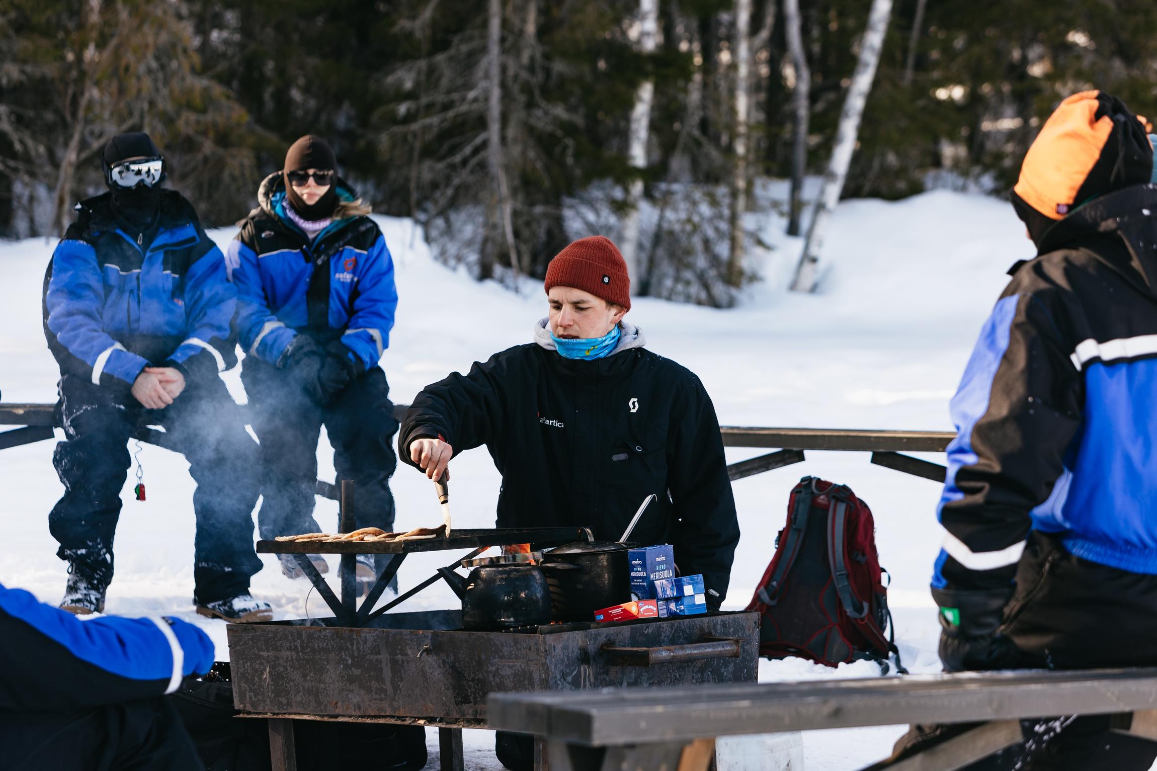 Rovaniemi Snowmobile & Ice Fishing Adventure with Campfire Lunch
