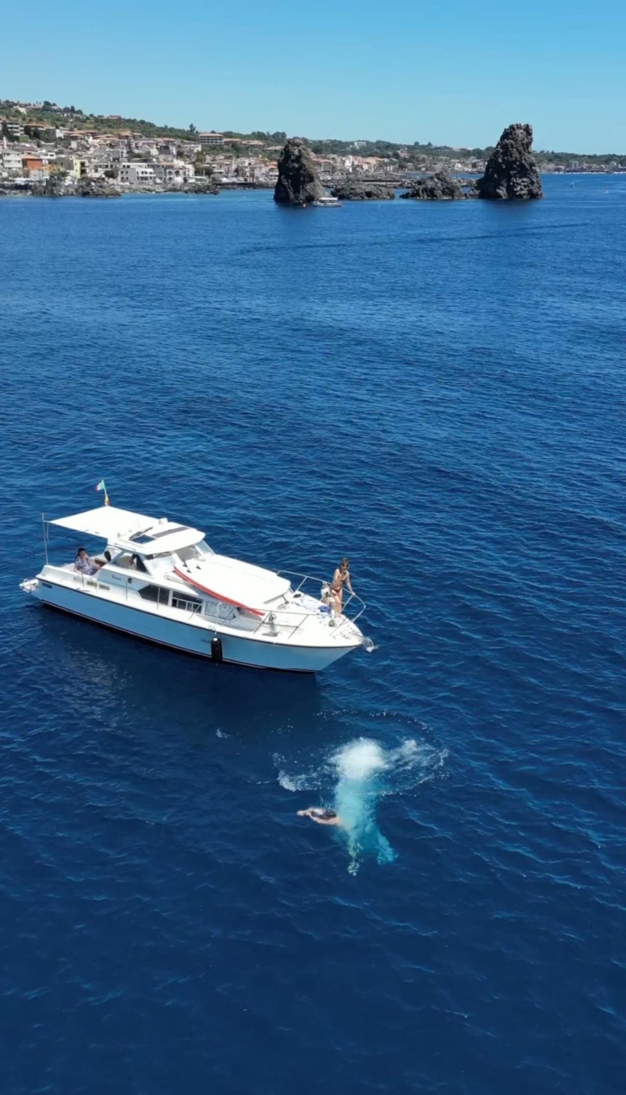 Acitrezza Faraglioni Boat Tour & Snorkeling from Catania
