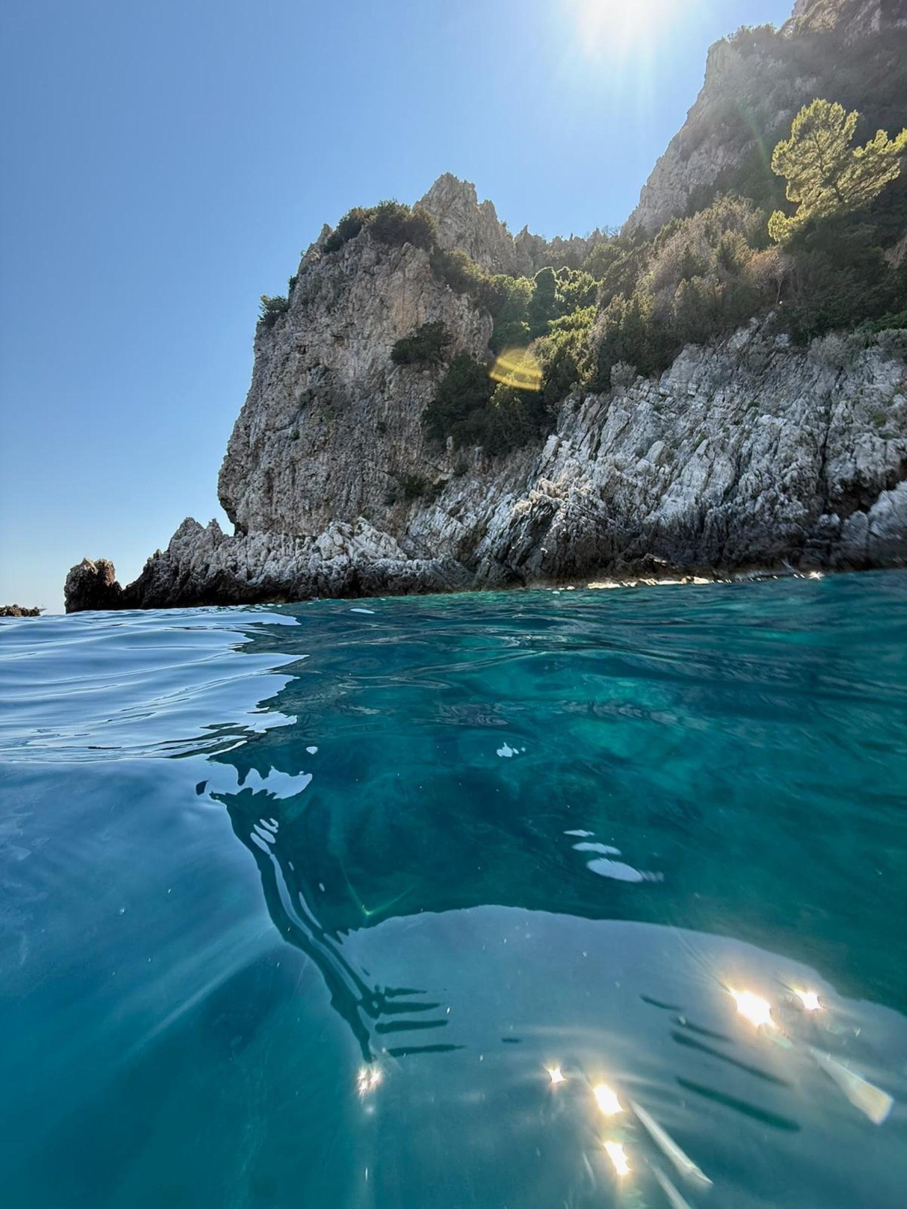 Capri Private Boat Tour: Faraglioni, Sea Caves & Swimming Stops