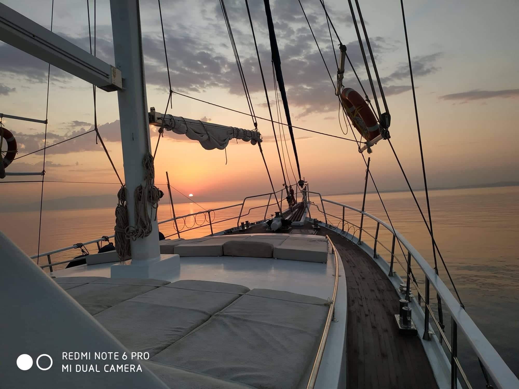 Mykonos Sunset Coastal Cruise with Dinner & Drinks