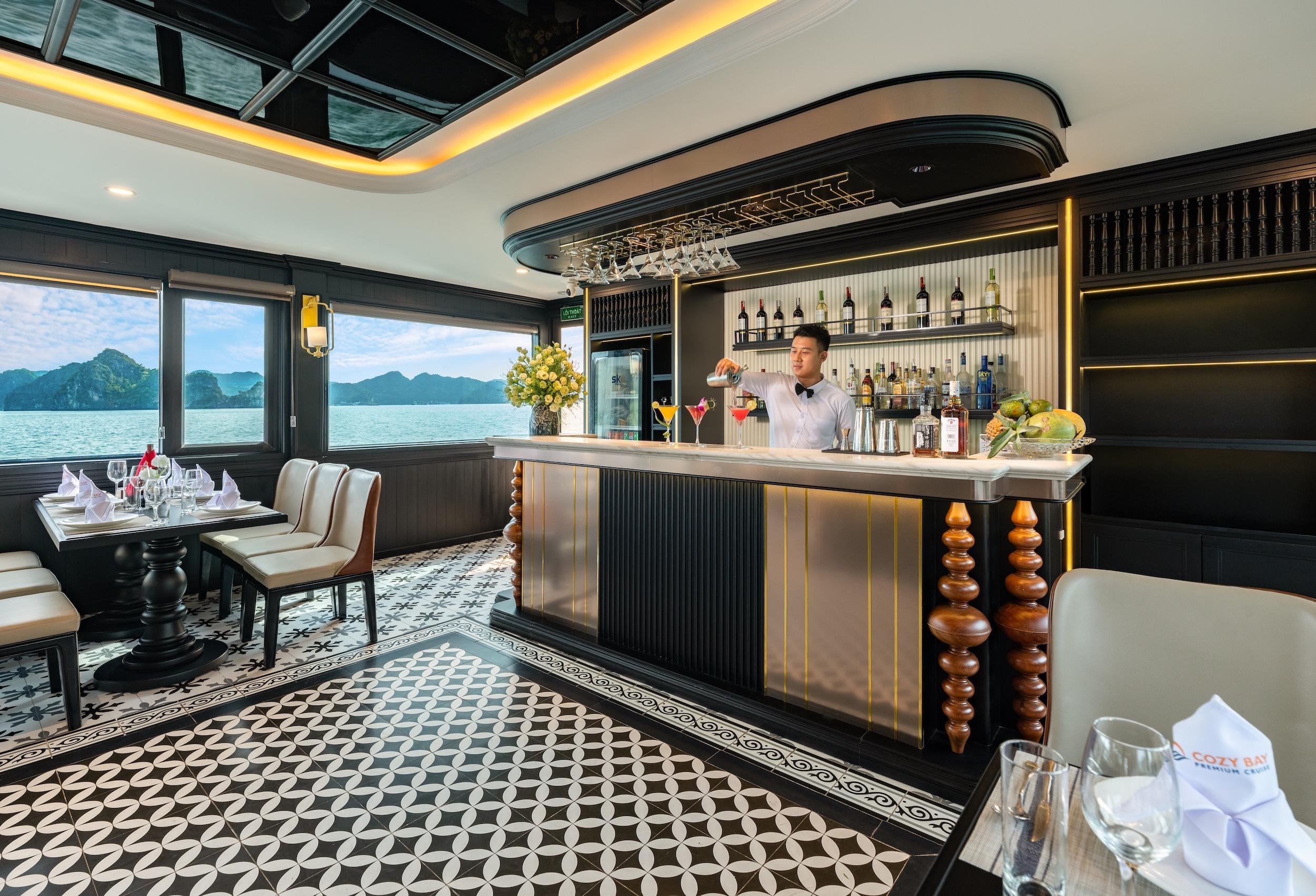 Halong Bay Luxury Day Cruise: Caves, Kayaking & Sunset Party