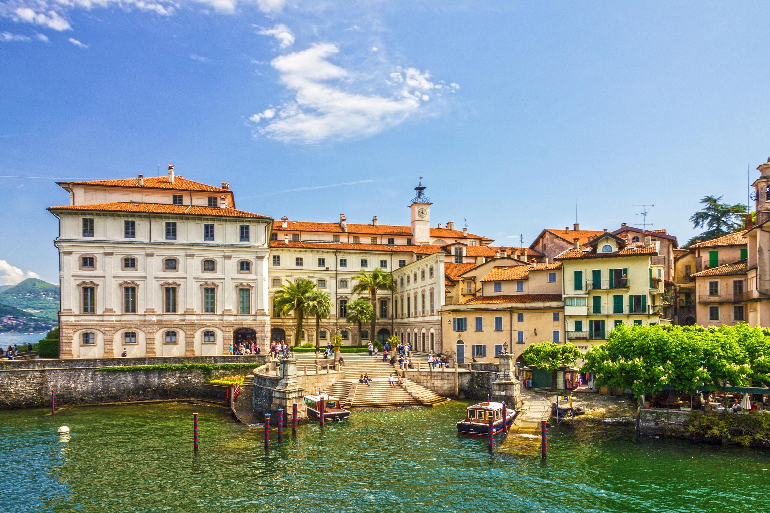 Passengers boarding the Borromean Islands day pass ferry at Stresa pier on Lake Maggiore