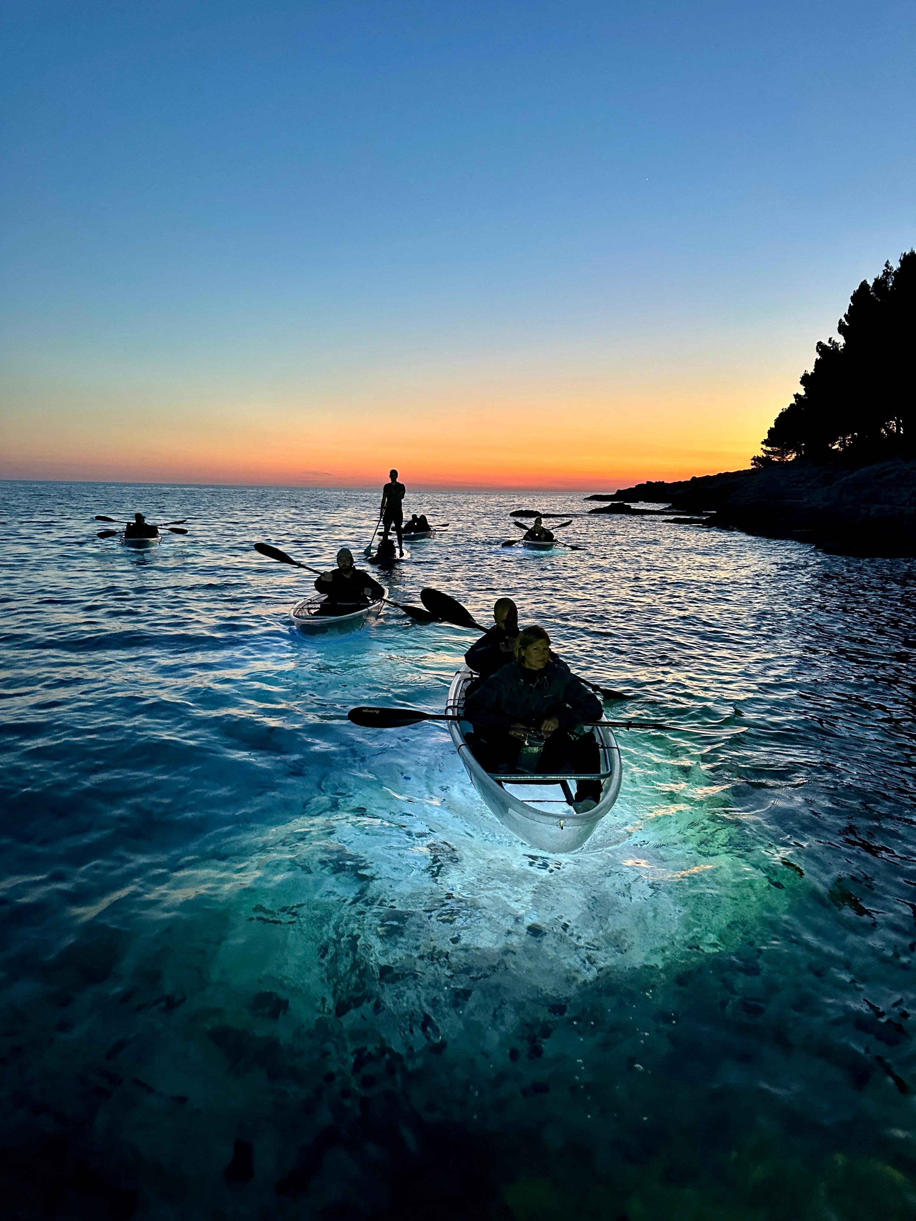 Pula: Transparent Kayak Sunset & Night Glow Tour