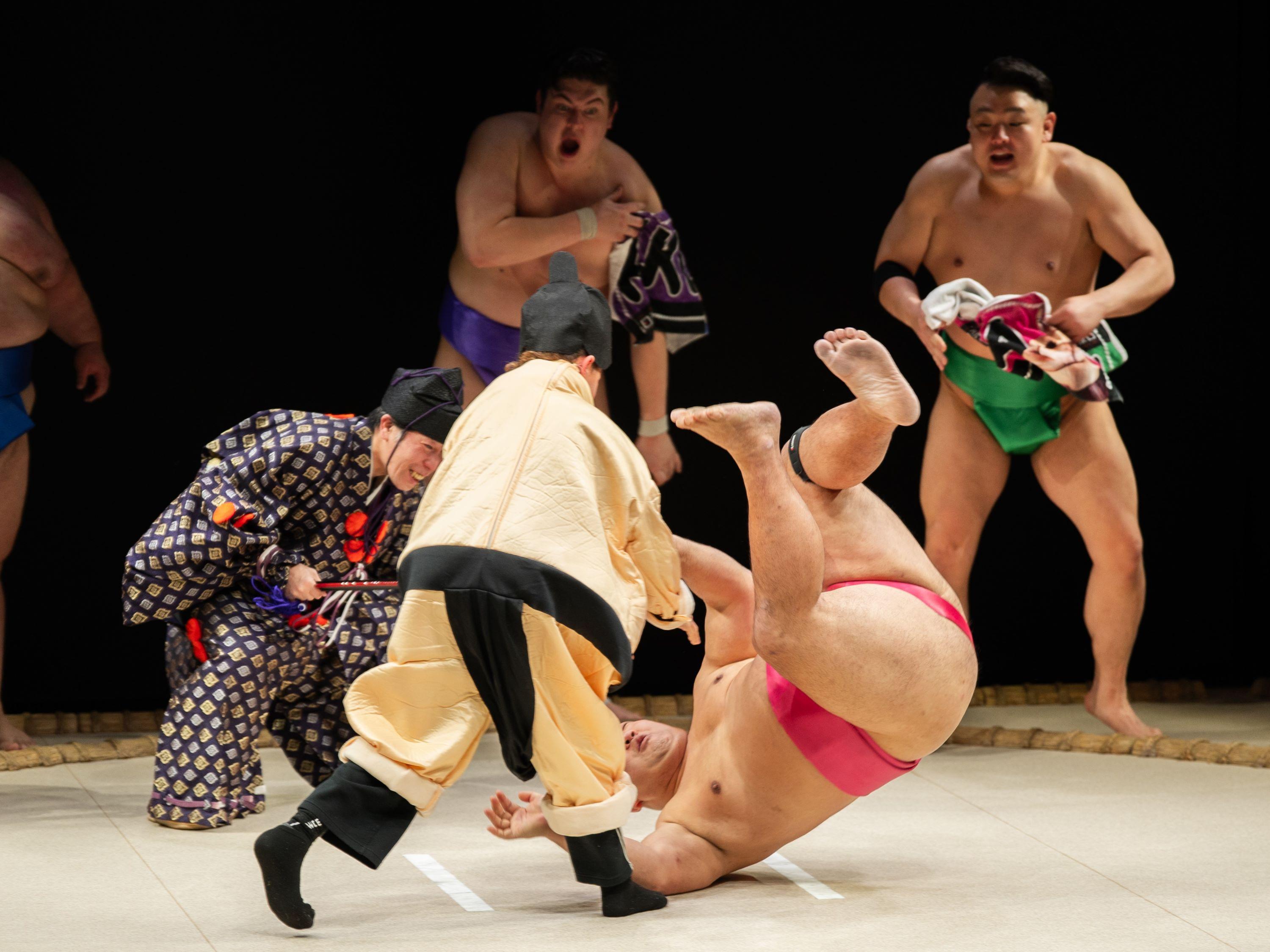 Sumo Performance and Dining Experience at Osaka's Hirakuza Hall