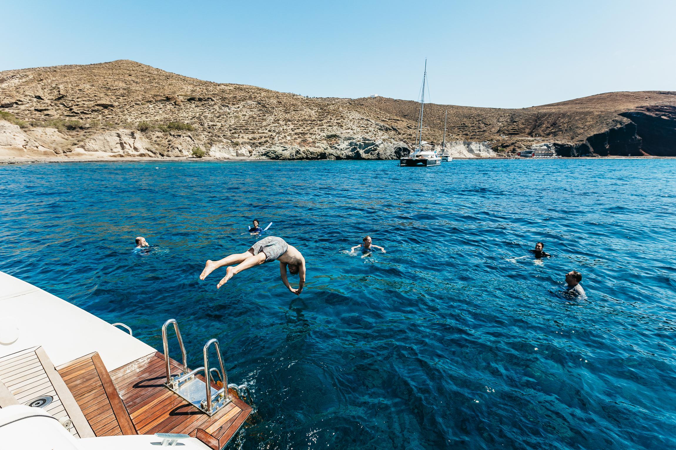 Santorini: Luxury Catamaran Day Trip with Meal and Open Bar