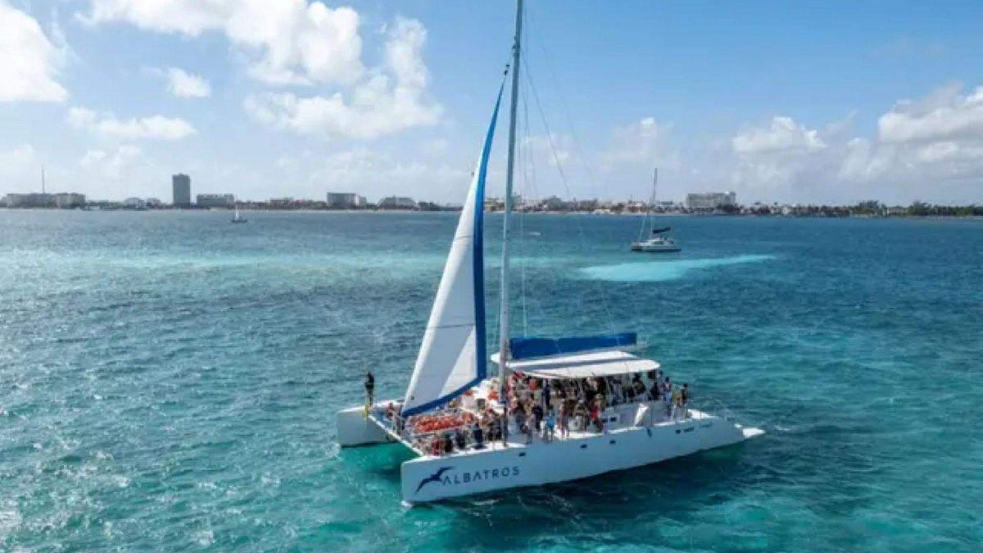 Isla Mujeres Adults-Only Catamaran with Snorkeling & Beach Club