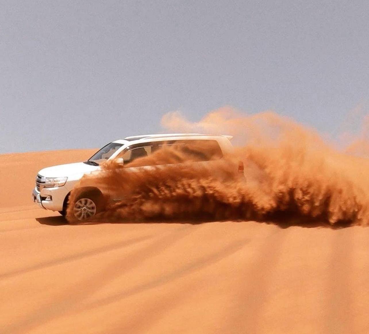 Doha Desert Adventure: Dune Bashing, Camel Rides & Sandboarding