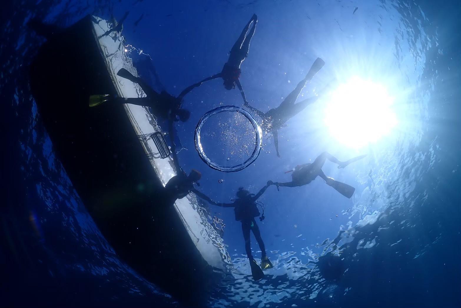 From Naha or Chatan: Blue Cave Snorkeling boat entry