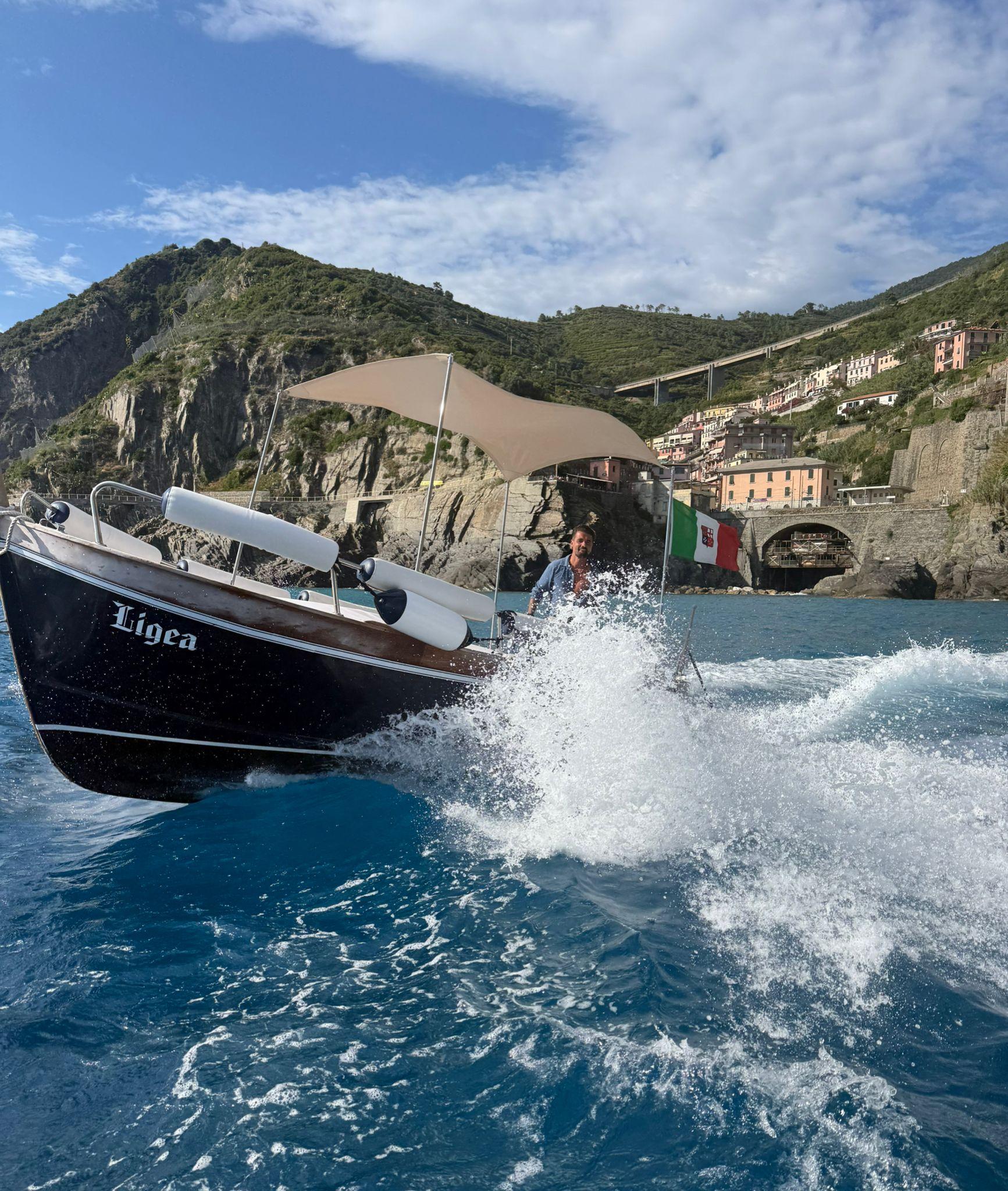Cinque Terre Traditional Boat Cruise with Swim Stops & Local Tastings