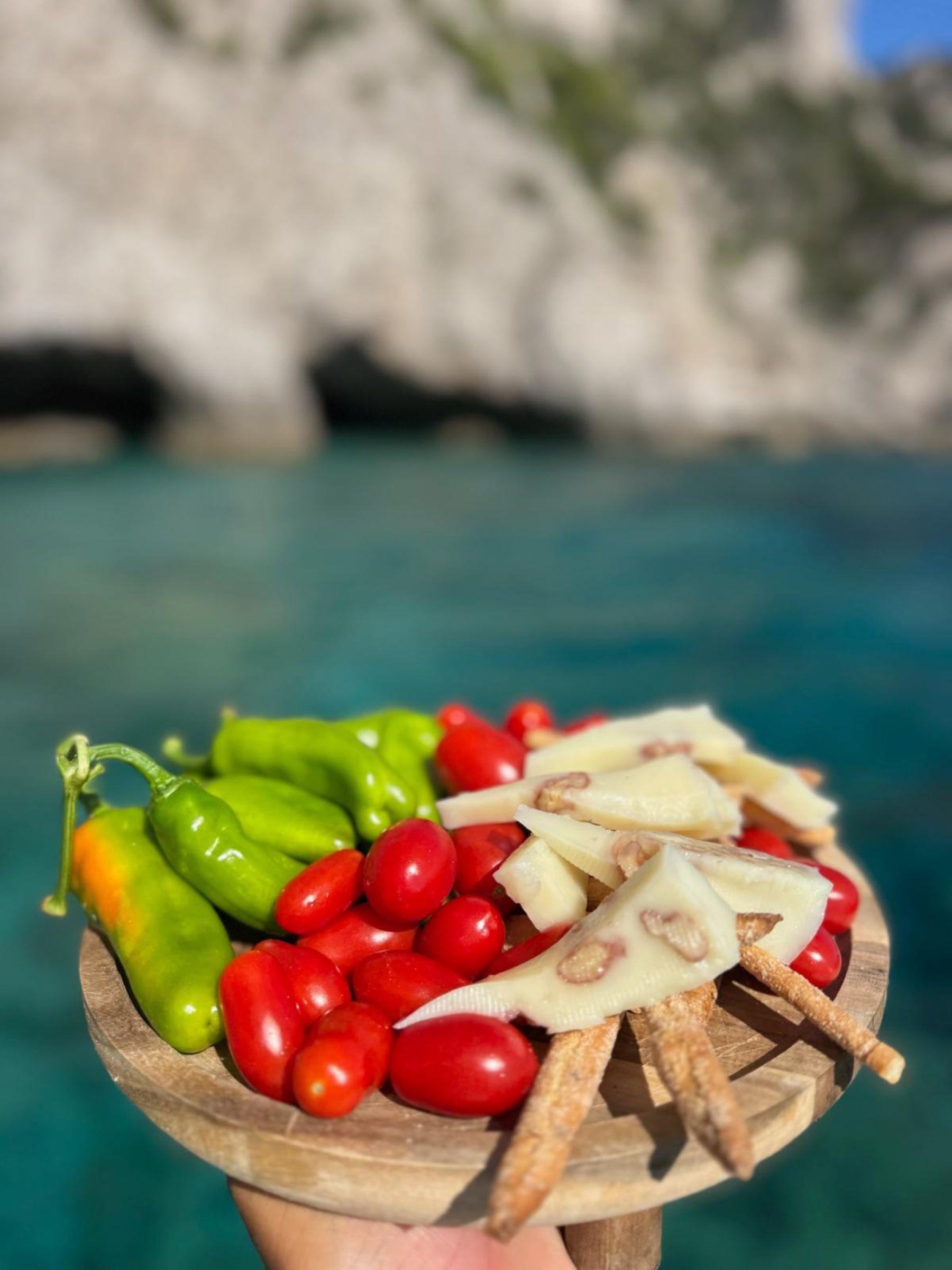 Capri Private Boat Tour: Faraglioni, Sea Caves & Swimming Stops