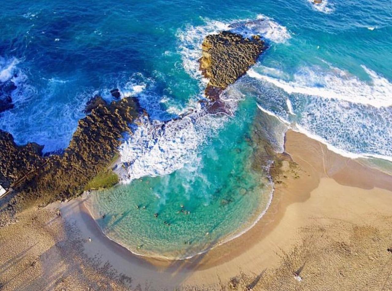 West Coast Beach Hopping & Sunset Tour from San Juan