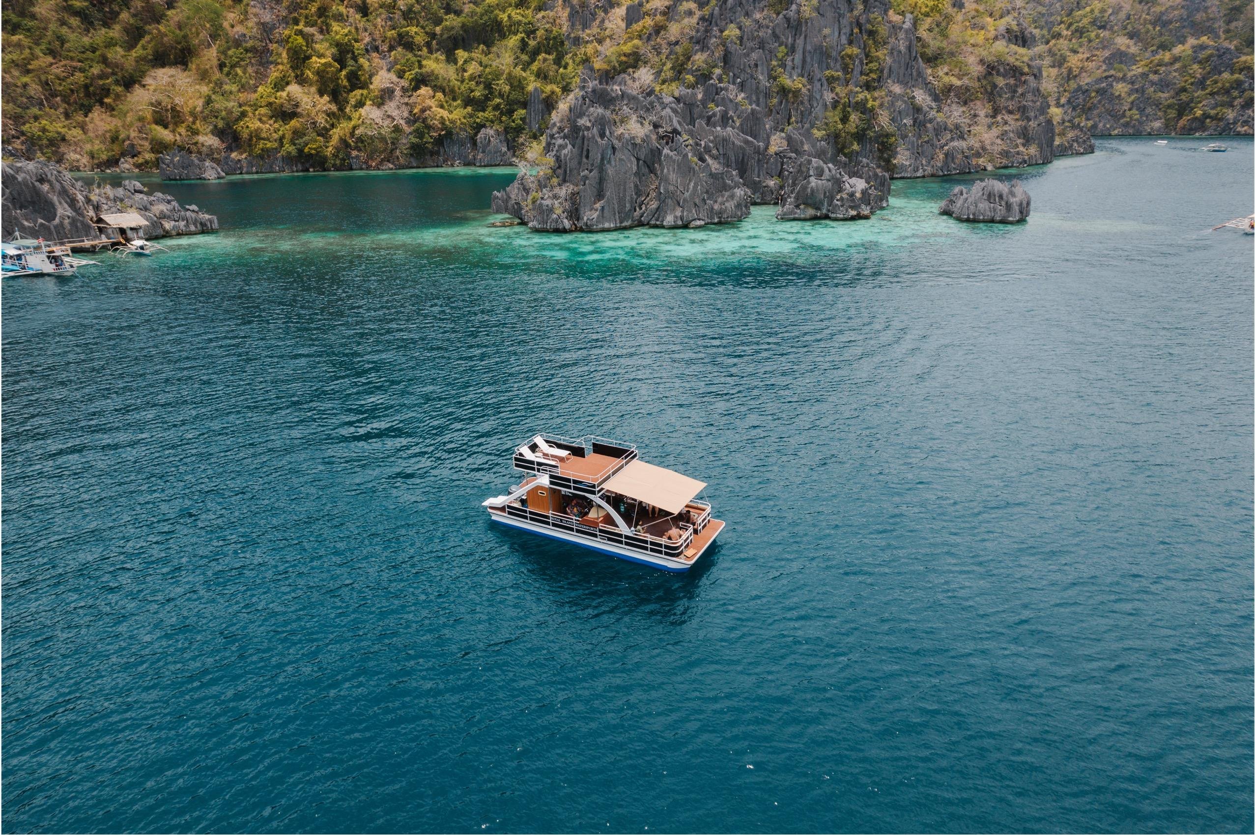 Coron Island Hopping: Private Double-Deck Party Boat with Slide