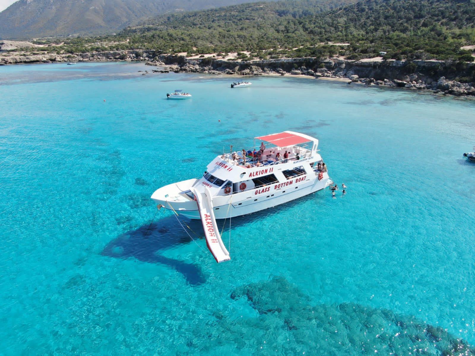 Glass-Bottom Boat Cruise to Blue Lagoon with Waterslide