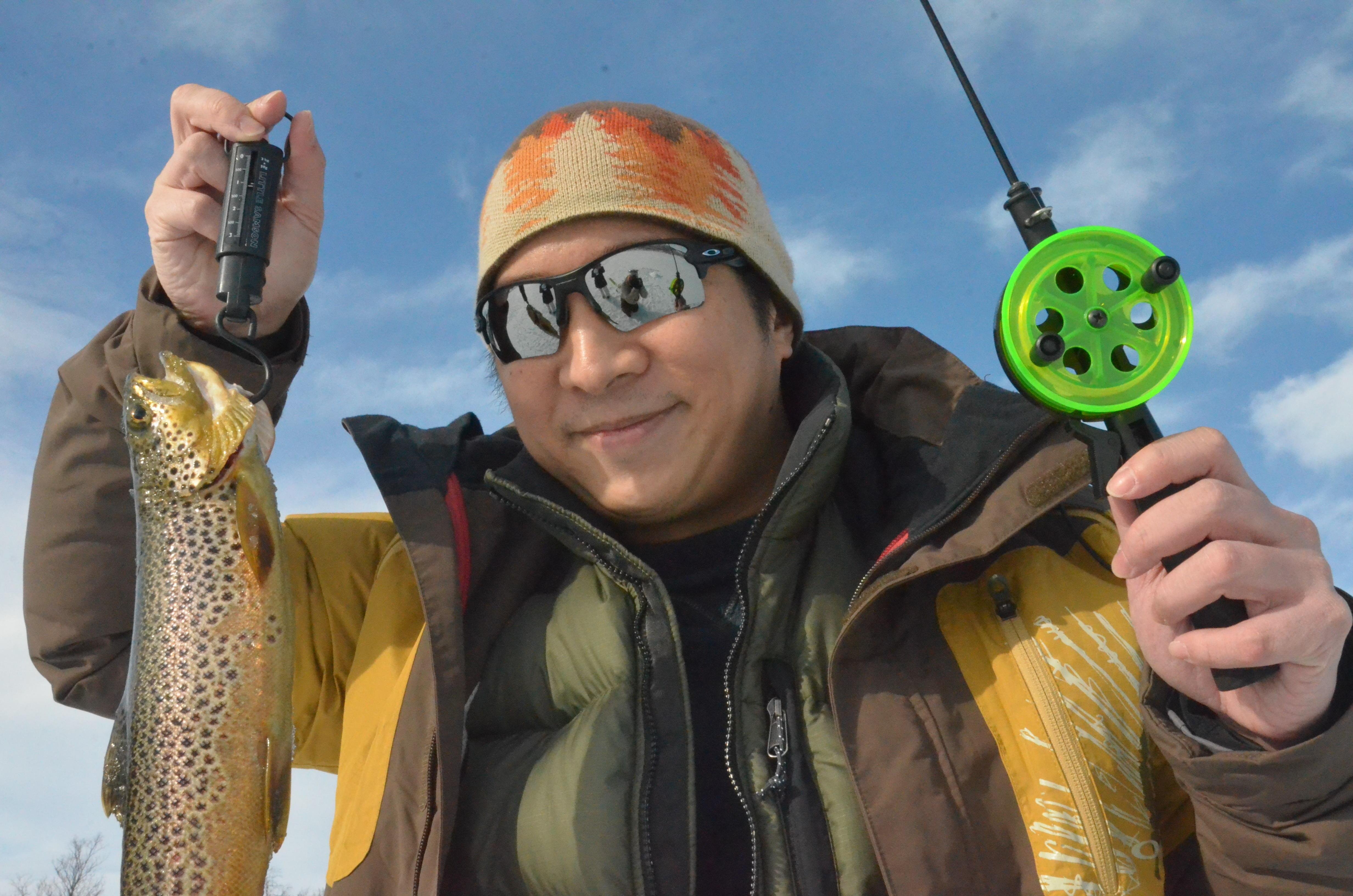 Arctic Ice Fishing Adventure with Campfire Lunch