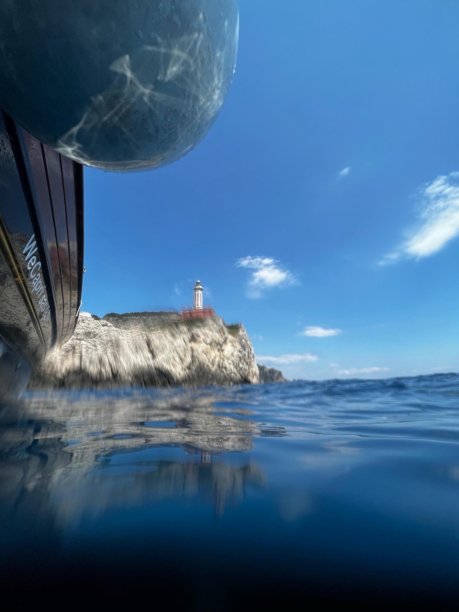 Capri Private Boat Tour: Faraglioni, Sea Caves & Swimming Stops
