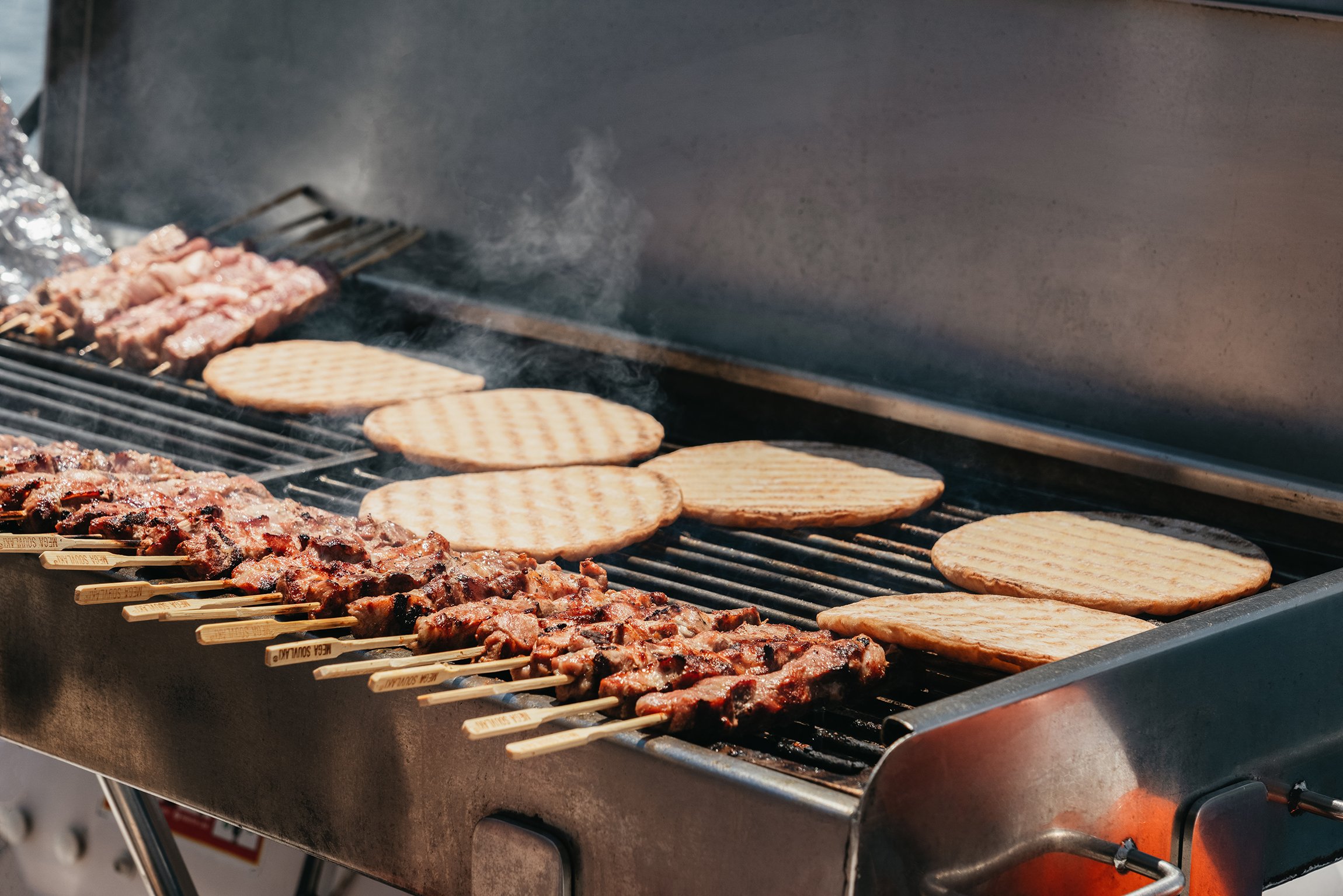 Santorini Catamaran Cruise with BBQ, Drinks & Music