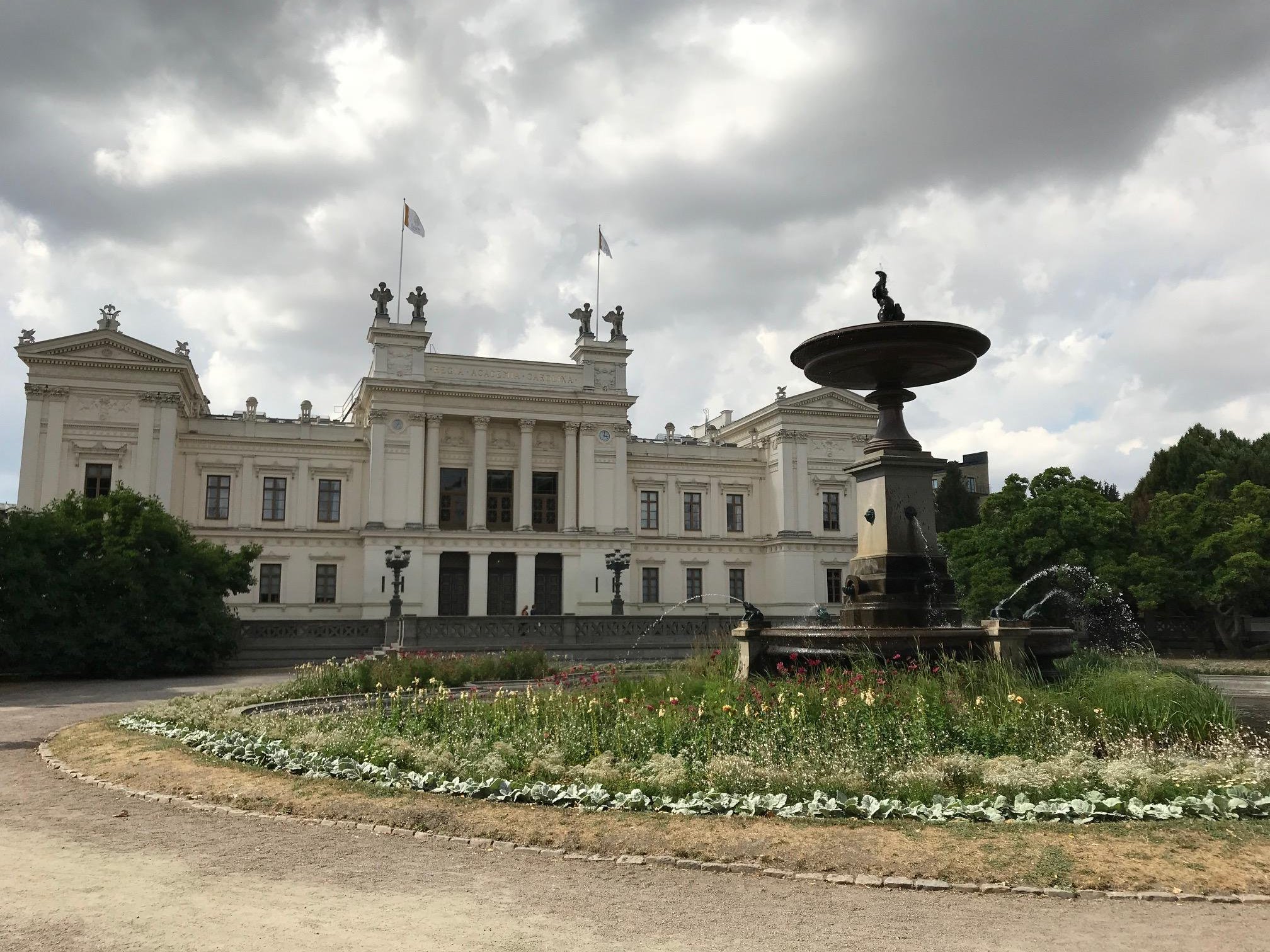 Lund University's main building with the fountain in front