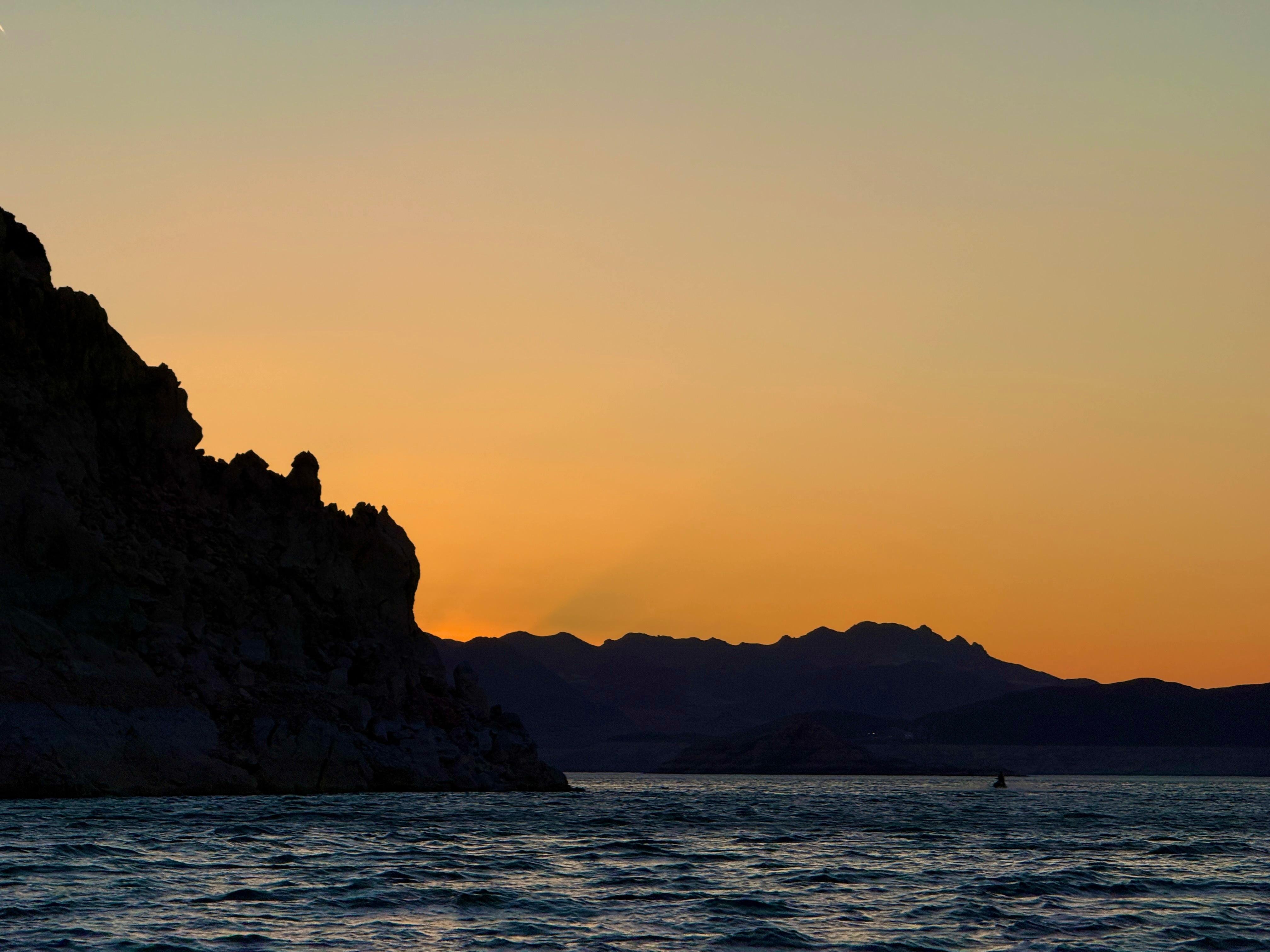 Emerald Cave Sunset Kayak Adventure with Campfire & Stargazing