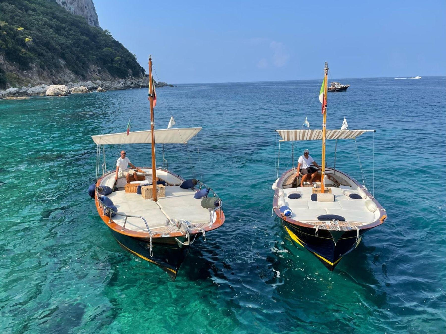 Capri Private Boat Tour: Faraglioni, Sea Caves & Swimming Stops