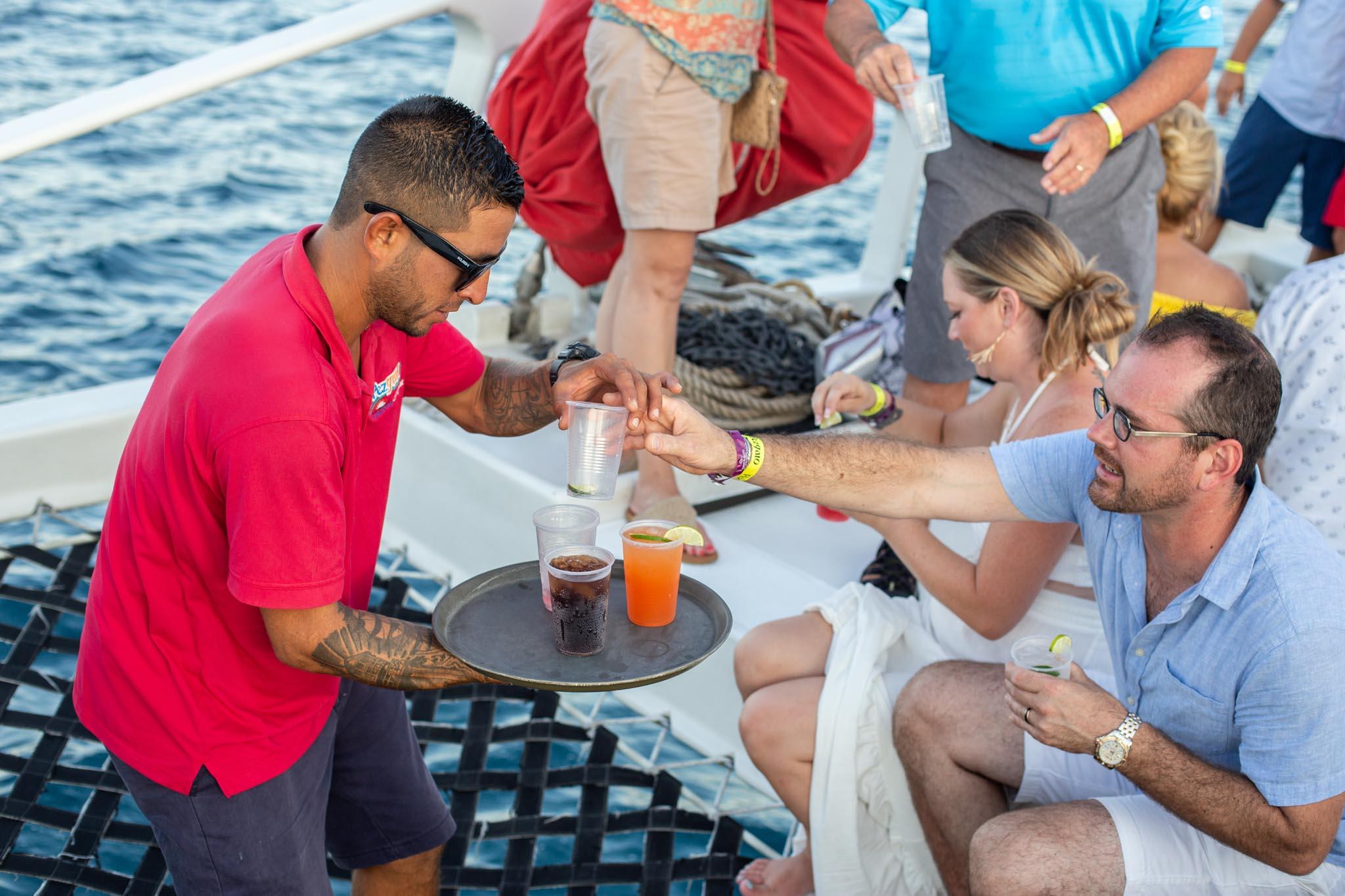 Cabo San Lucas Sunset Catamaran Cruise with Open Bar & Appetizers