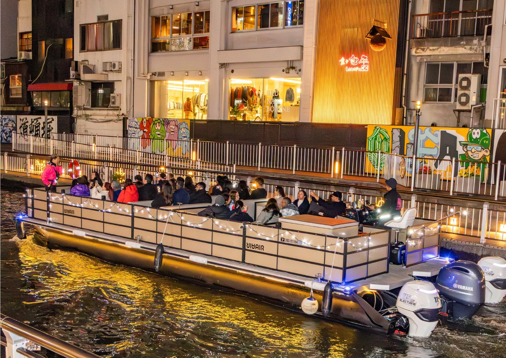 Dotonbori river cruise — Glico sign and neon on the Osaka canal — image 3