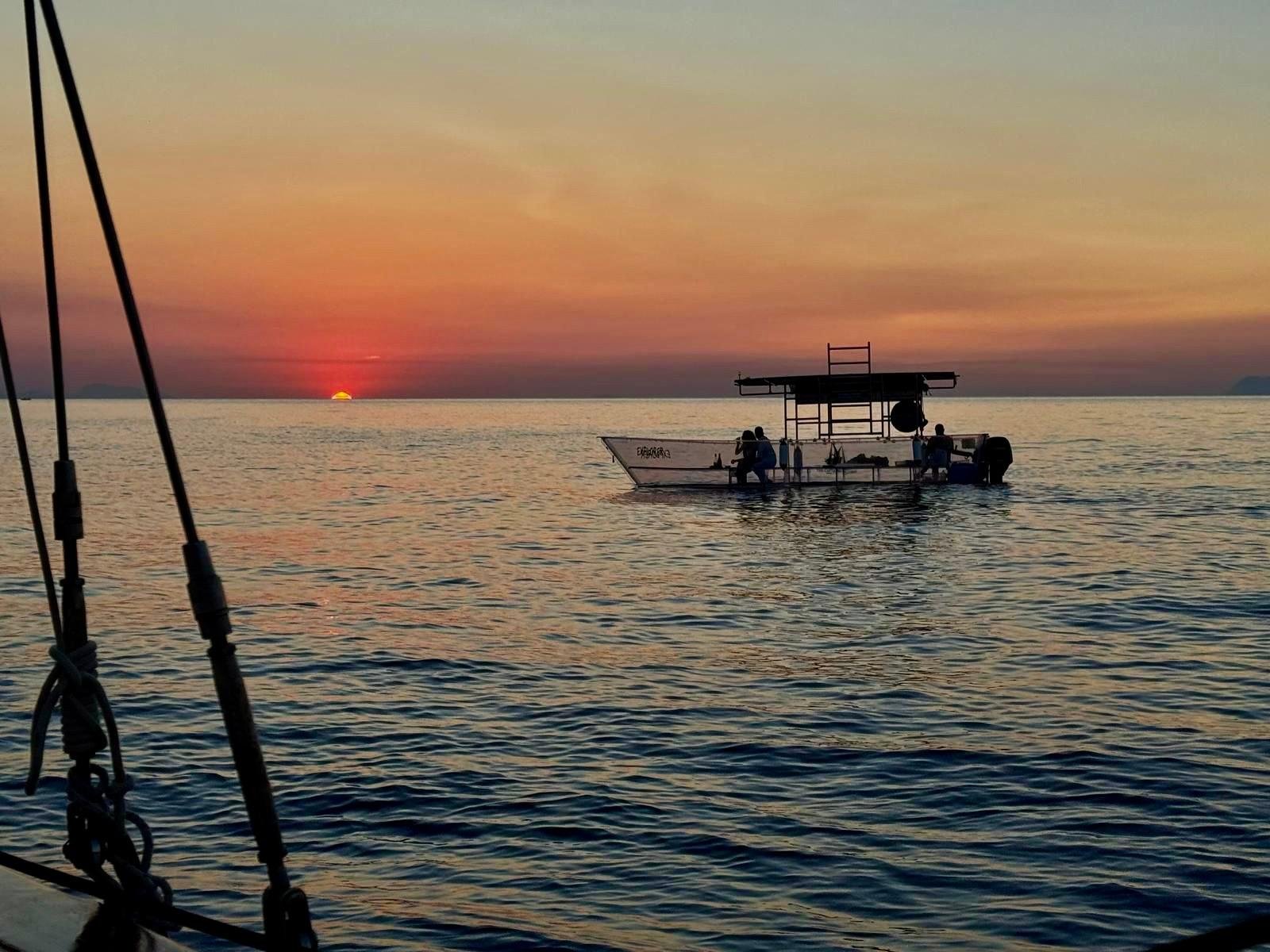 Scilla Sunset Aperitif on Transparent Boat