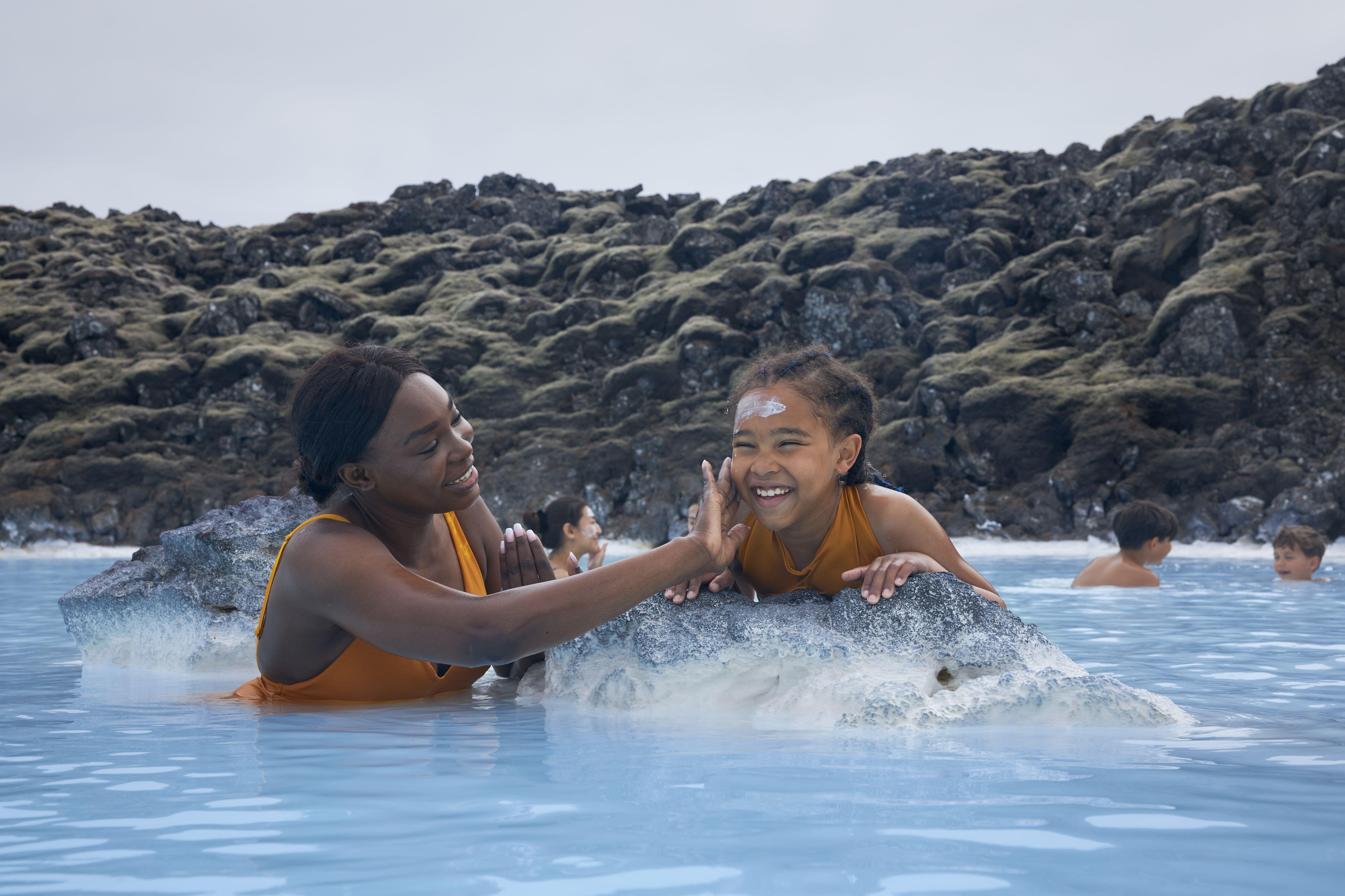 Blue Lagoon geothermal spa admission — bathers in the silica-blue lagoon near Keflavik, Iceland