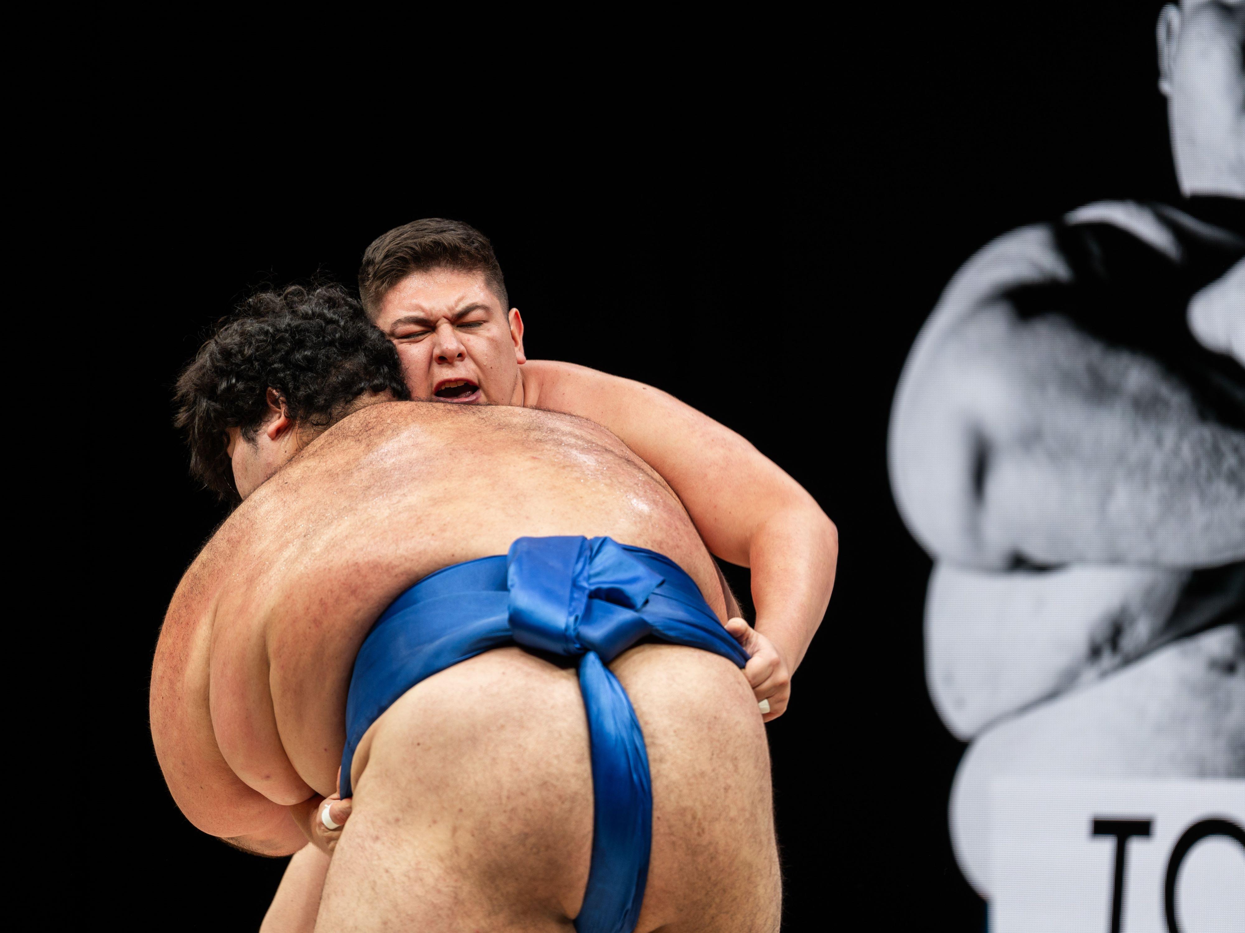 Sumo Performance and Dining Experience at Osaka's Hirakuza Hall