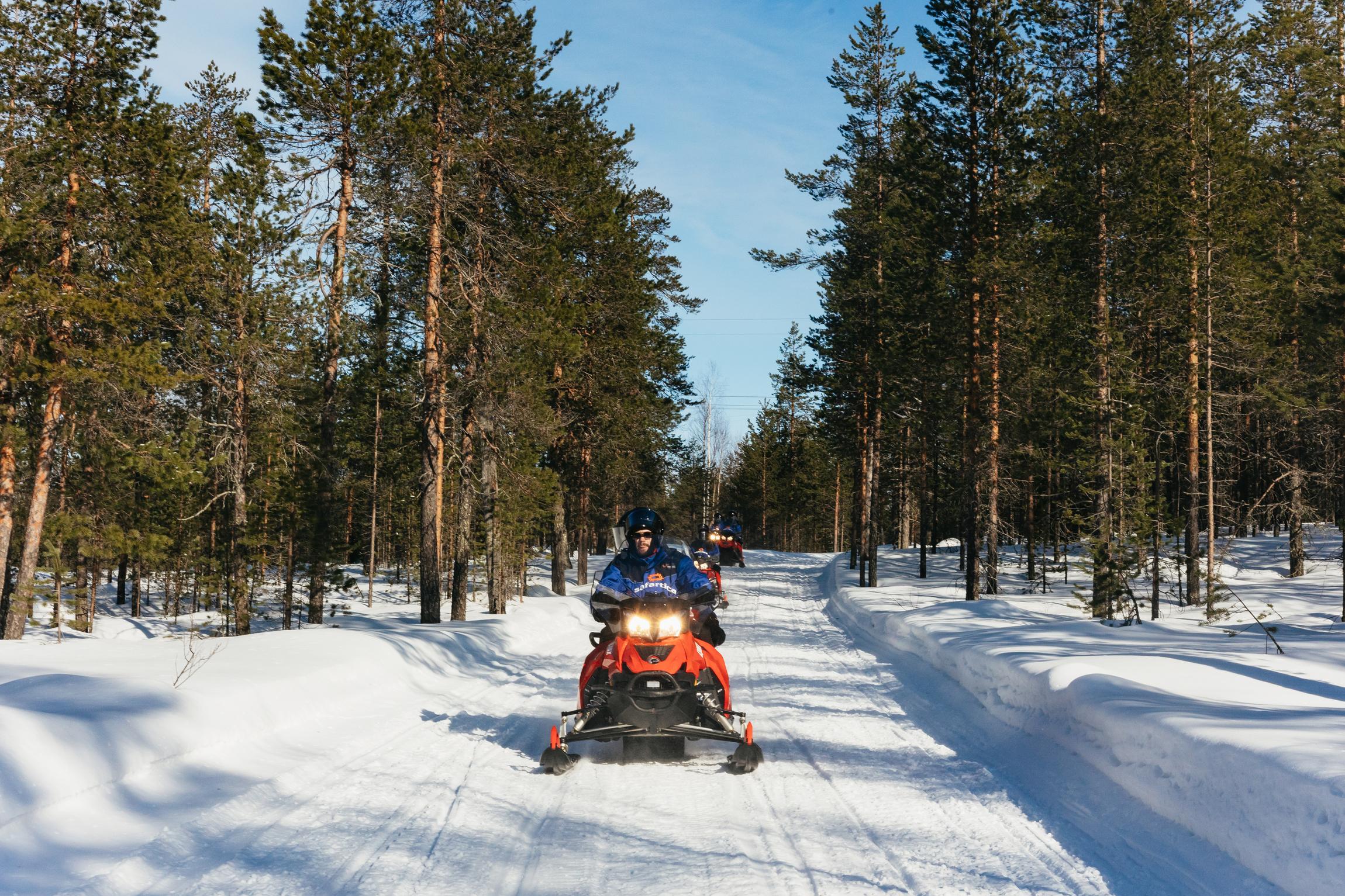 Rovaniemi Snowmobile & Ice Fishing Adventure with Campfire Lunch