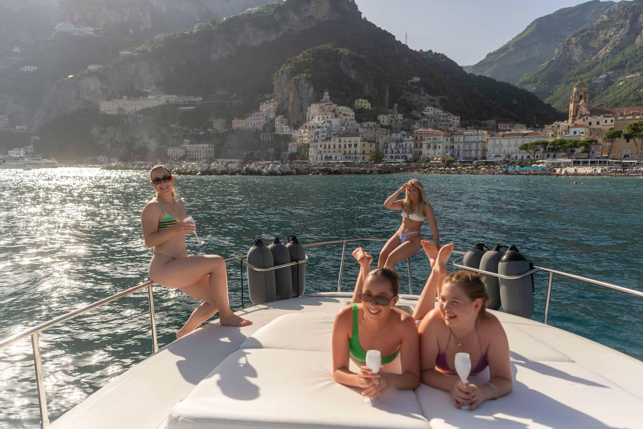 Amalfi Coast Gozzo Boat Tour: Caves, Beaches & Prosecco from Positano