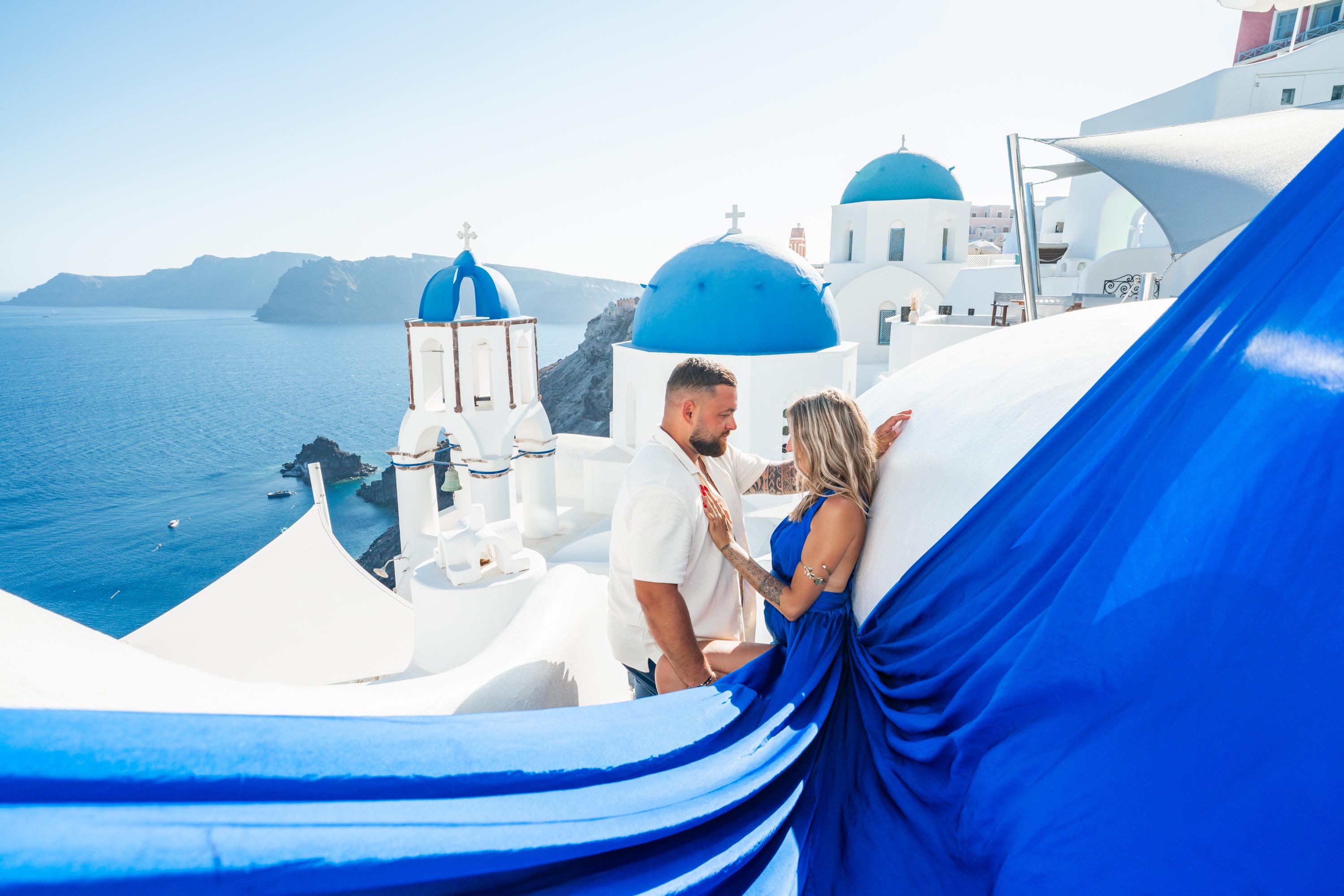 Santorini Flying Dress Photography Session with Blue Domes Access