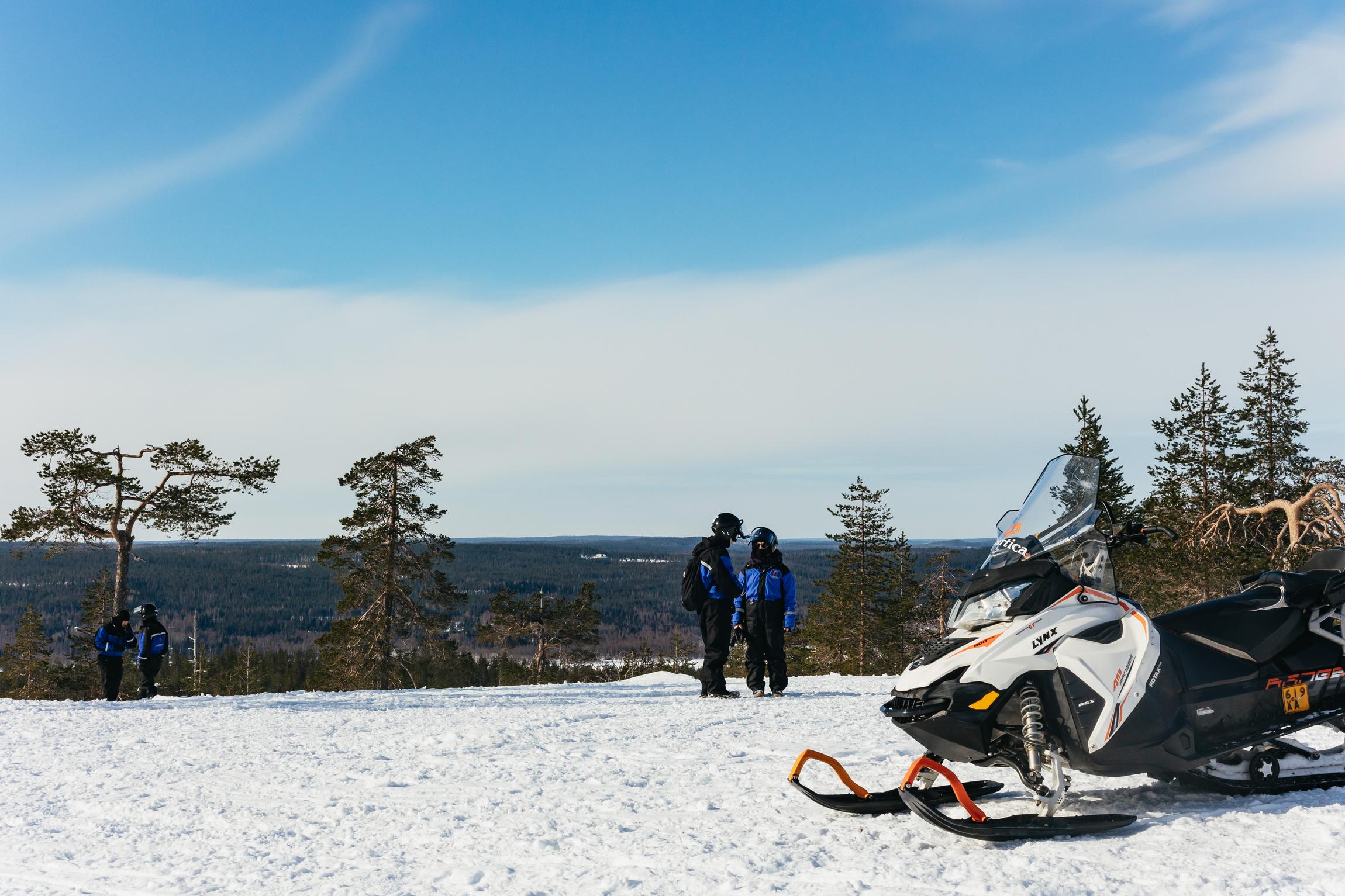 Rovaniemi Snowmobile & Ice Fishing Adventure with Campfire Lunch