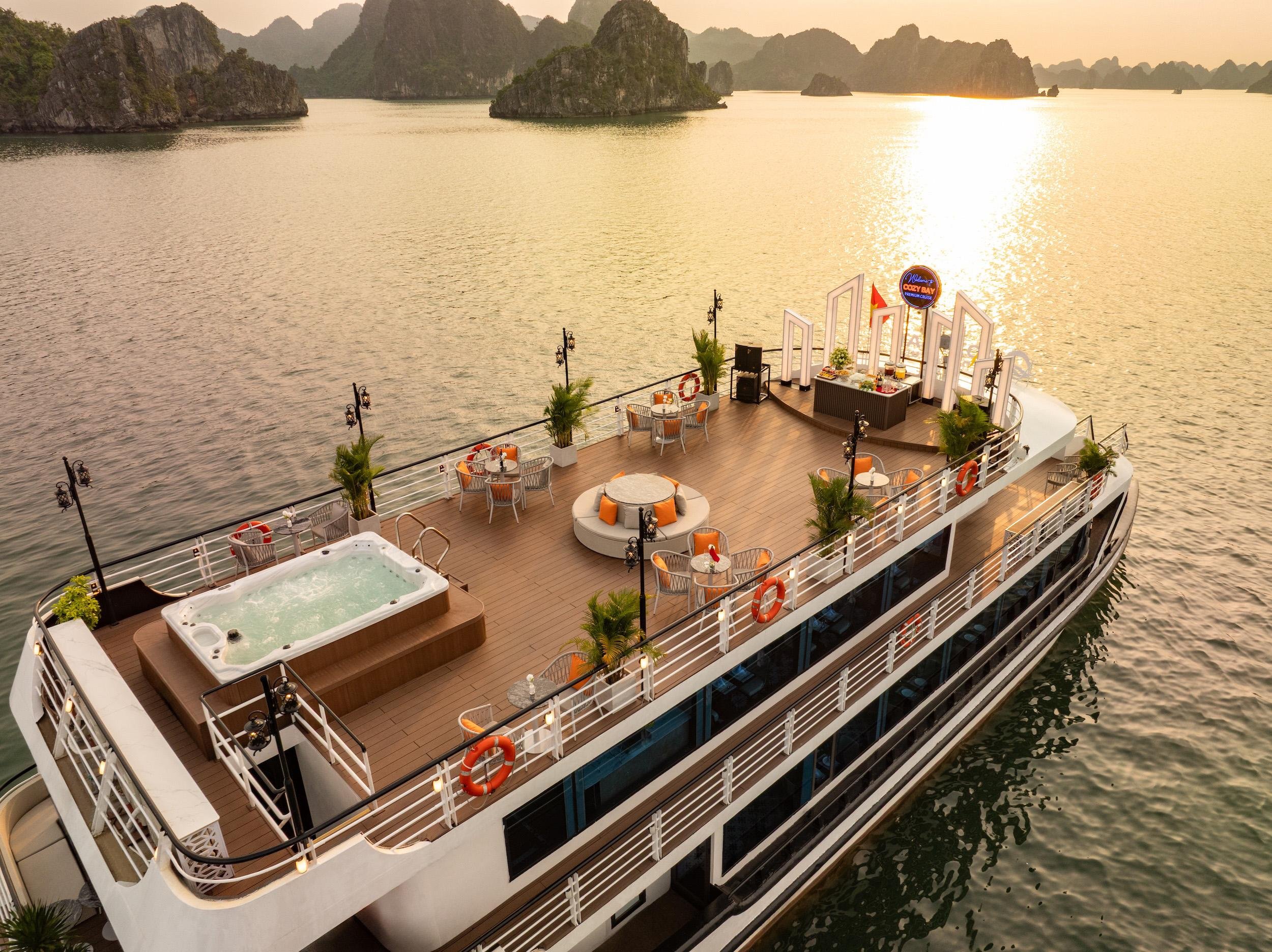 Halong Bay Luxury Day Cruise: Caves, Kayaking & Sunset Party